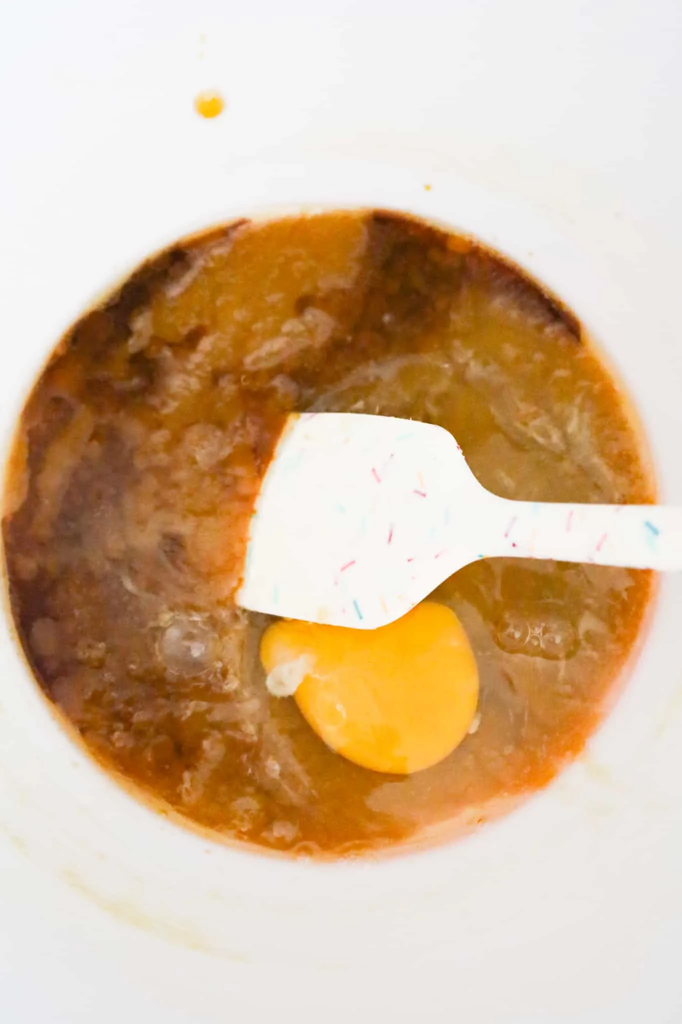 vanilla extract, eggs, brown sugar and melted butter in a mixing bowl