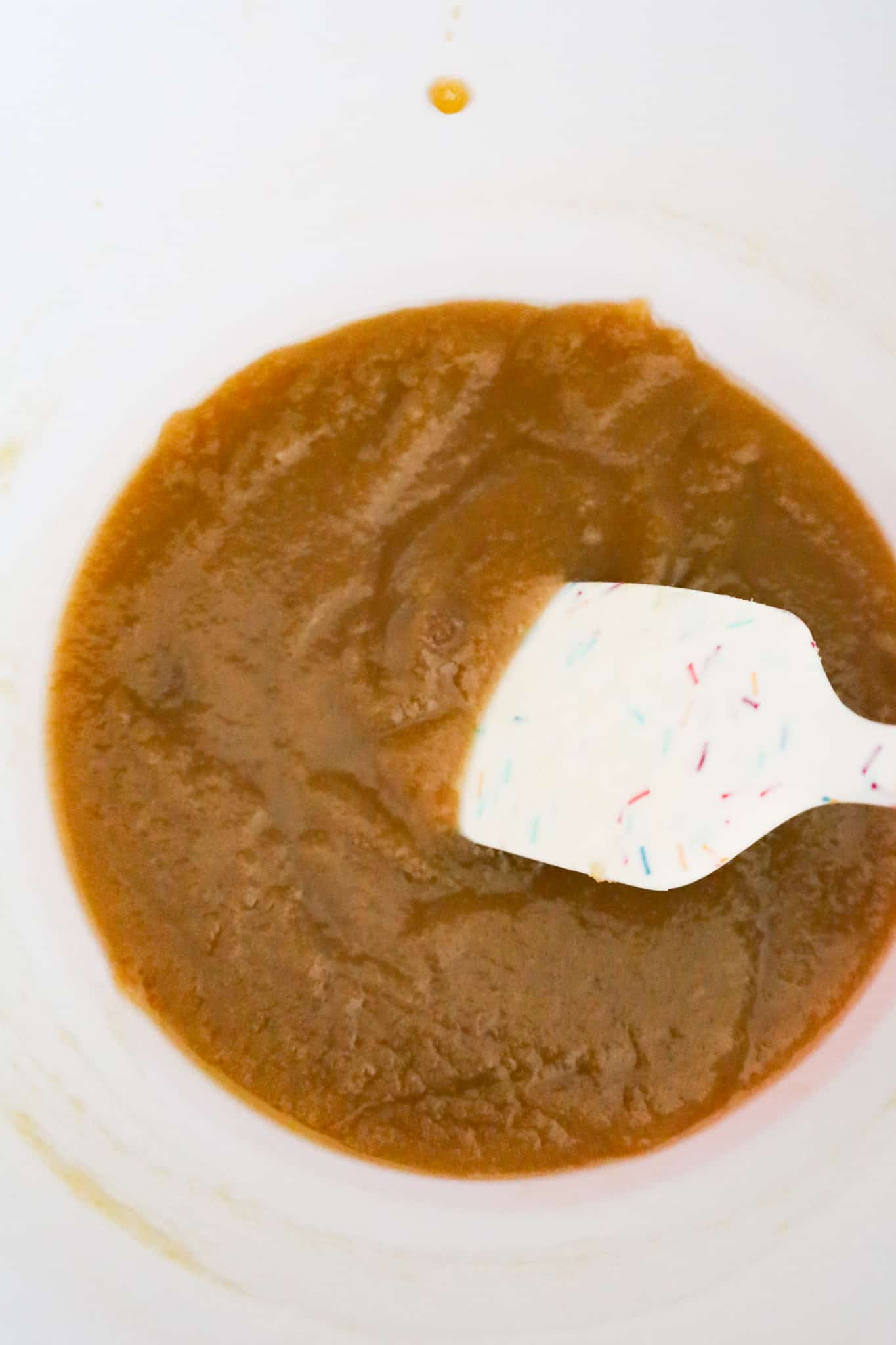 brown sugar and melted butter mixture in a mixing bowl