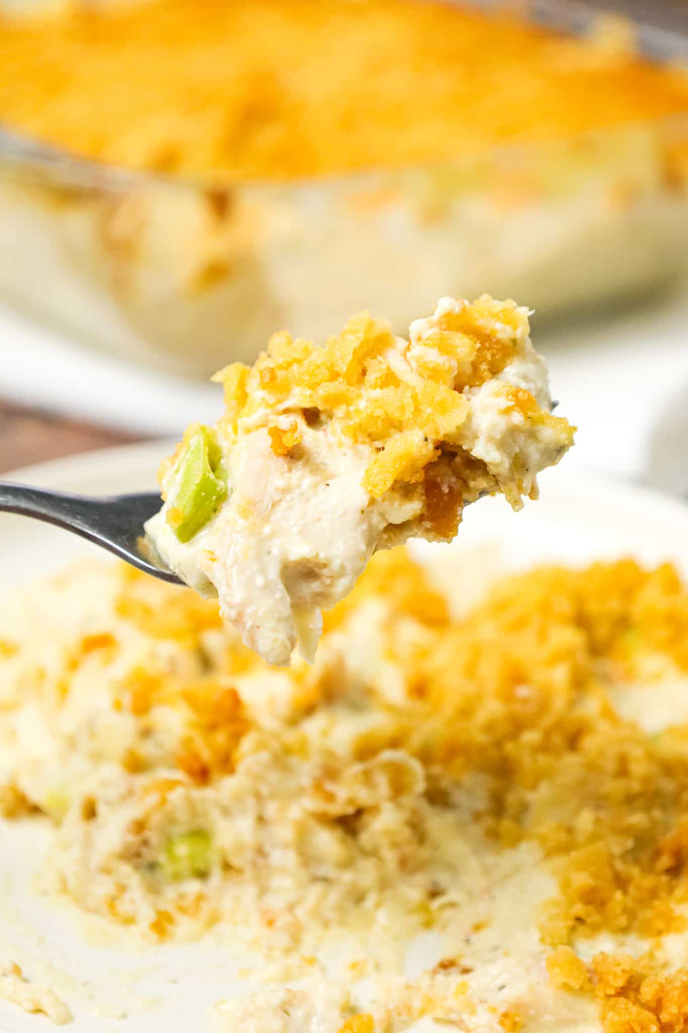 Million Dollar Chicken Casserole is an easy chicken casserole recipe using precooked shredded chicken in a creamy sauce and topped with Ritz cracker crumbs.