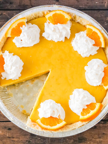 Orange Pie is a sweet and tart pie made with a store bought pie crust and a creamy homemade orange filling.