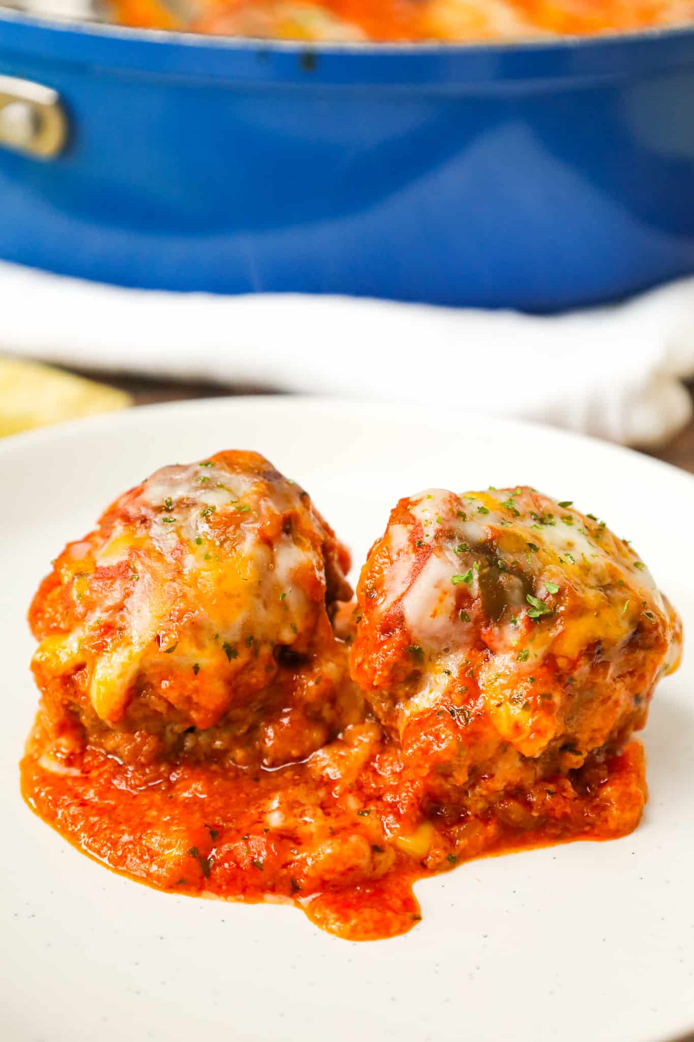 Tex Mex Meatballs are an easy dinner recipe made with ground beef, crushed corn chips, taco seasoning and cheese cooked in a sauce made with tomato sauce and salsa.