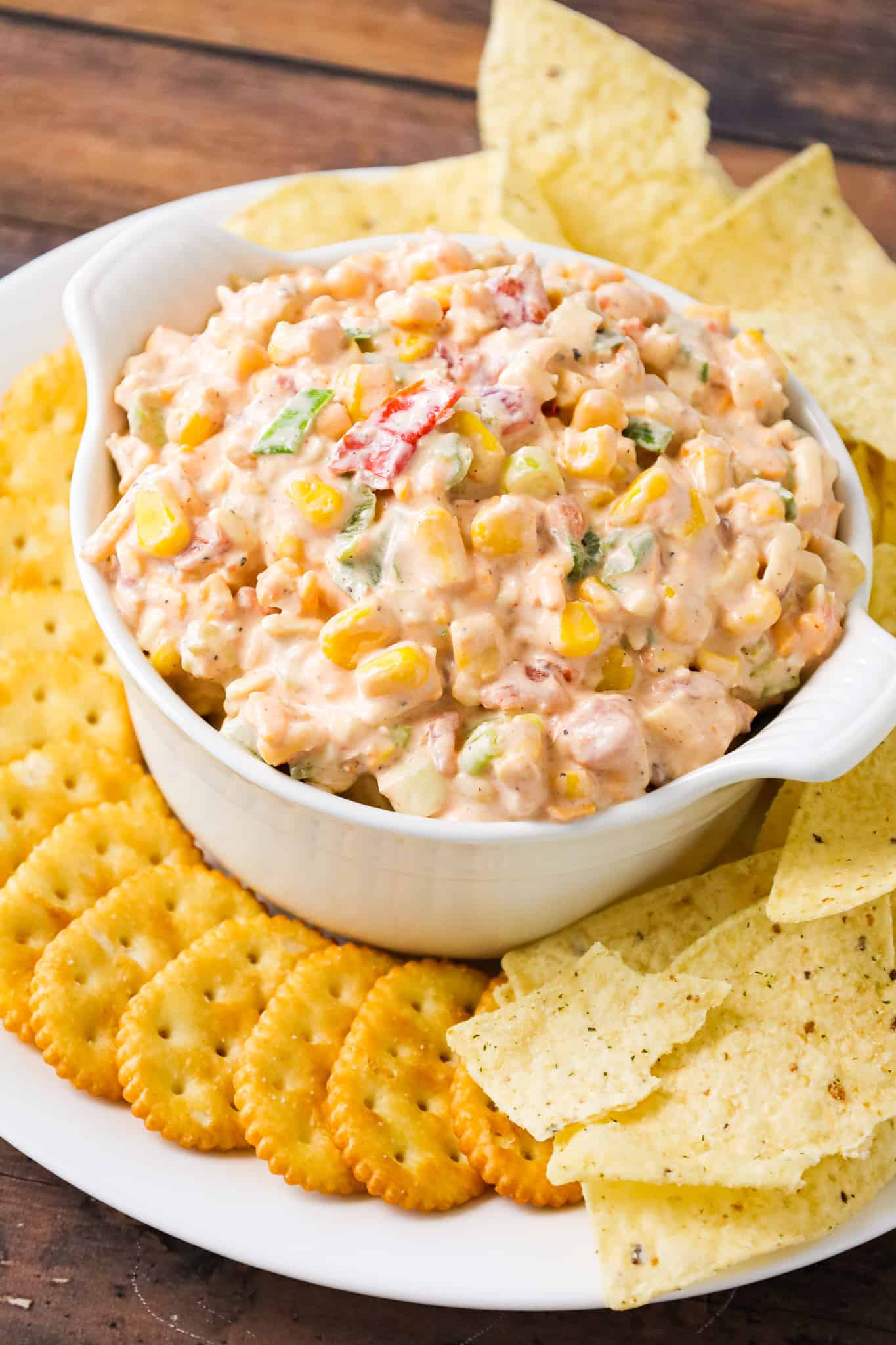 Corn Dip with Cream Cheese is a tasty cold dip recipe made with canned corn, cream cheese, sour cream, Rotel, shredded cheese and chopped green onions.