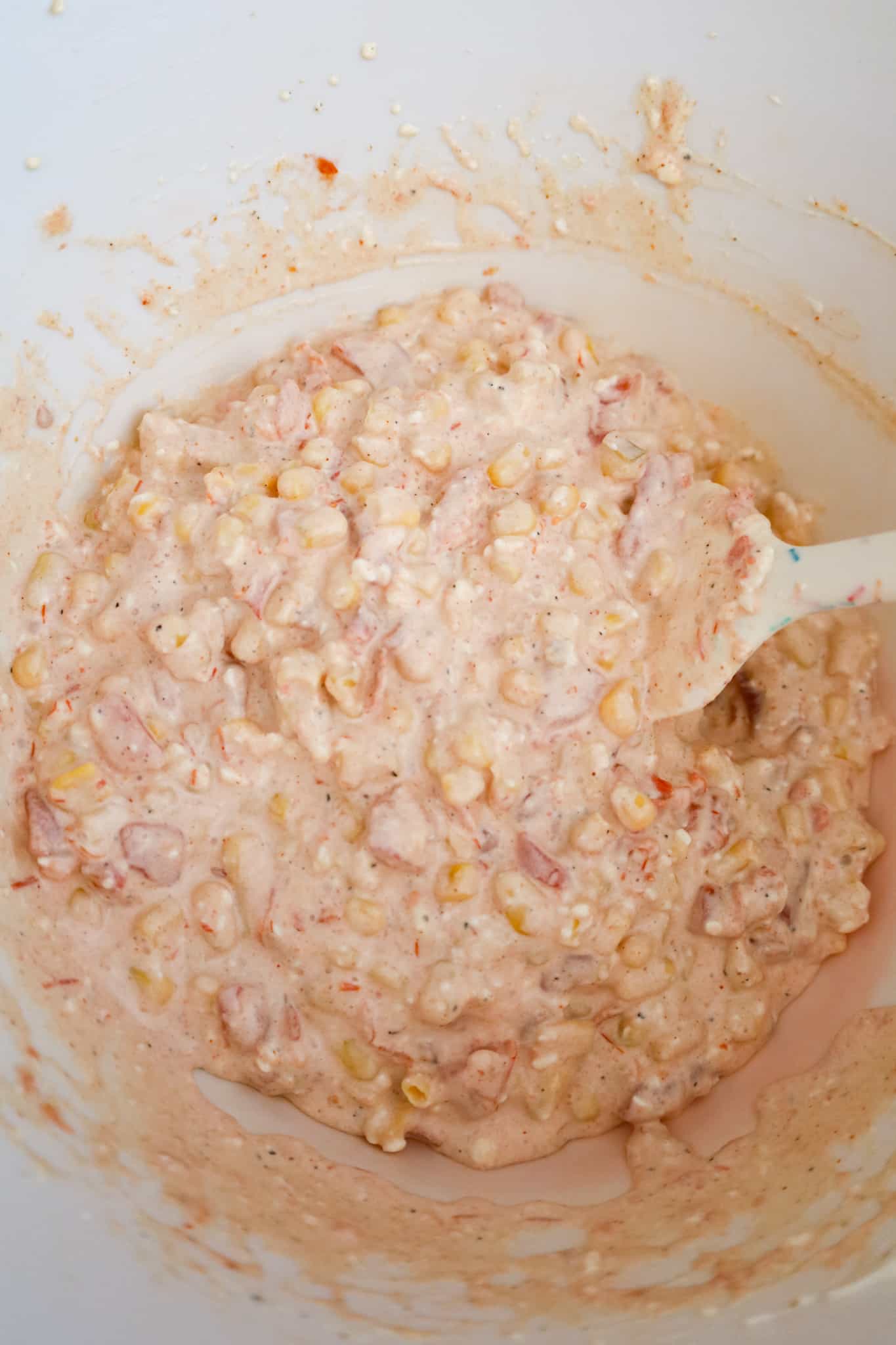corn and cream cheese mixture in a mixing bowl
