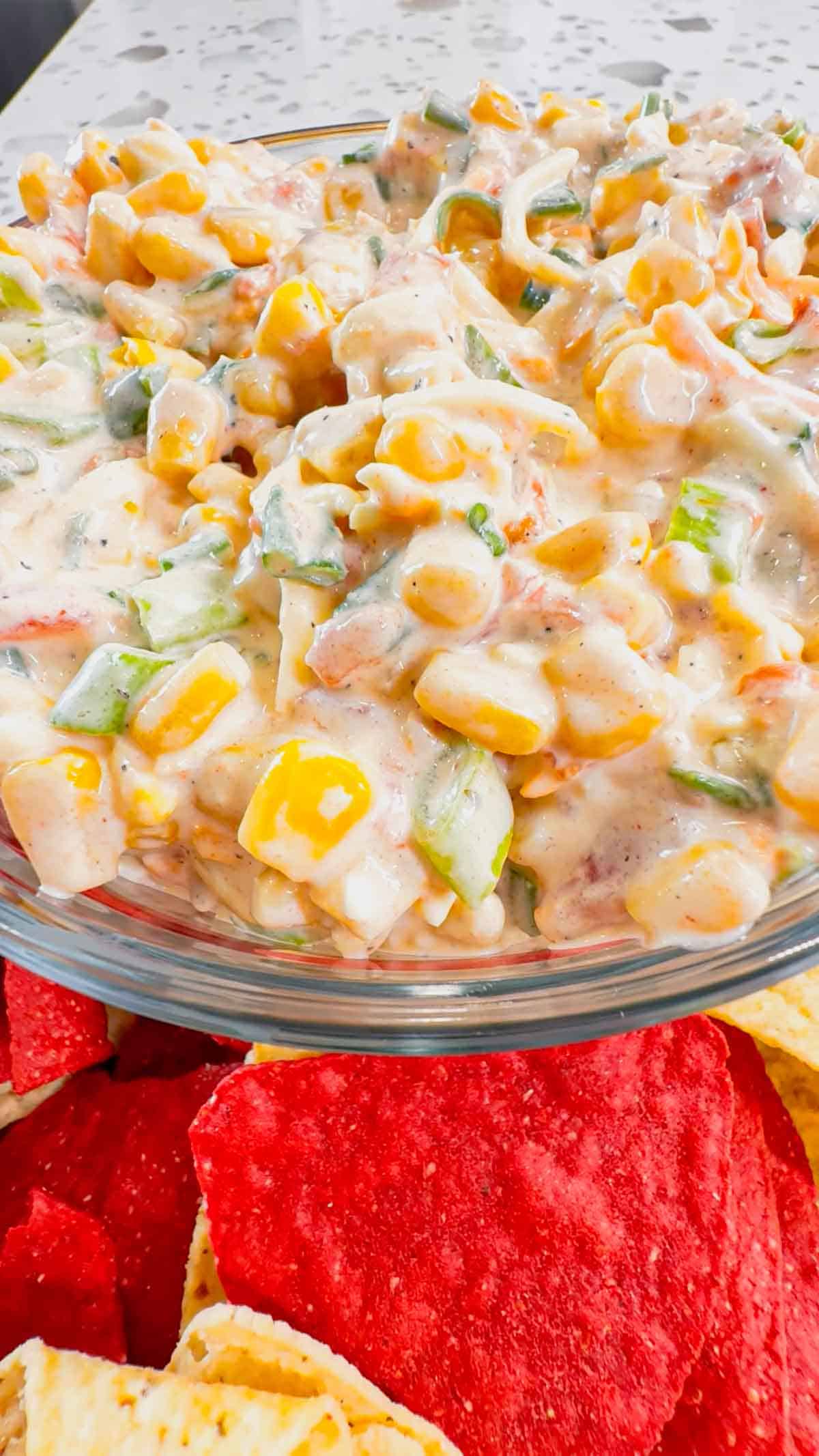 Corn Dip with Cream Cheese is a tasty cold dip recipe made with canned corn, cream cheese, sour cream, Rotel, shredded cheese and chopped green onions.