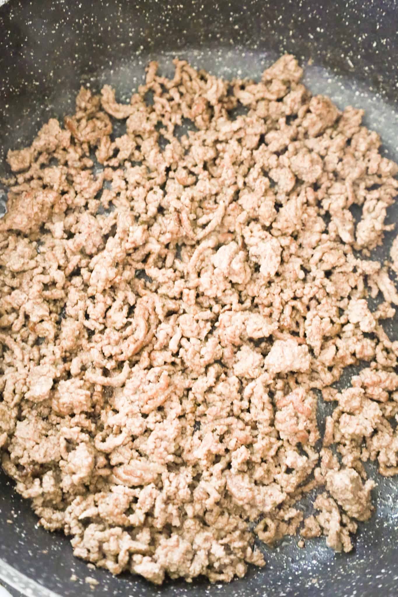 cooked ground beef in a skillet