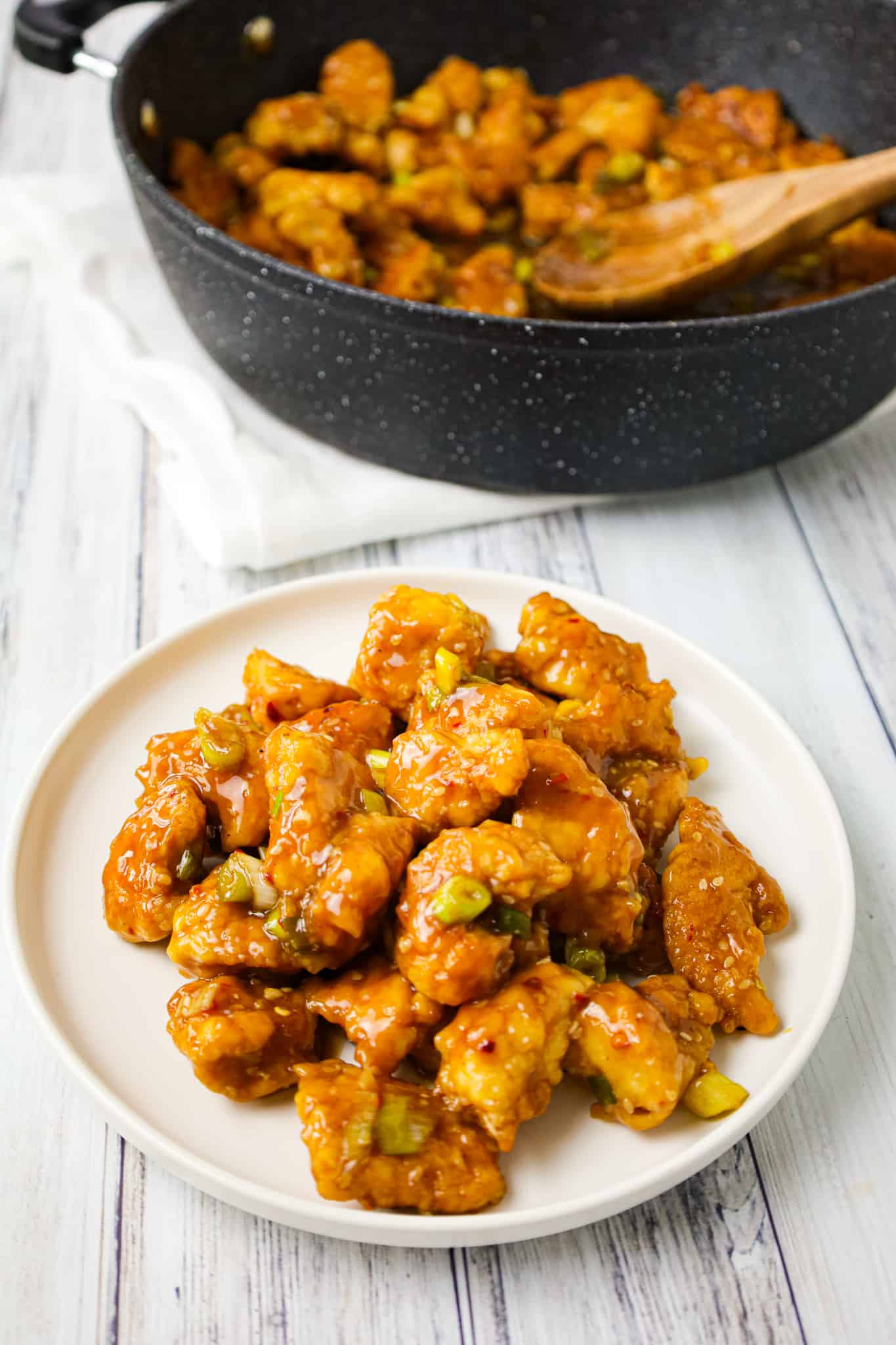 Empress Chicken is a delicious breaded Chinese chicken recipe with a spicy sweet and sour sauce.