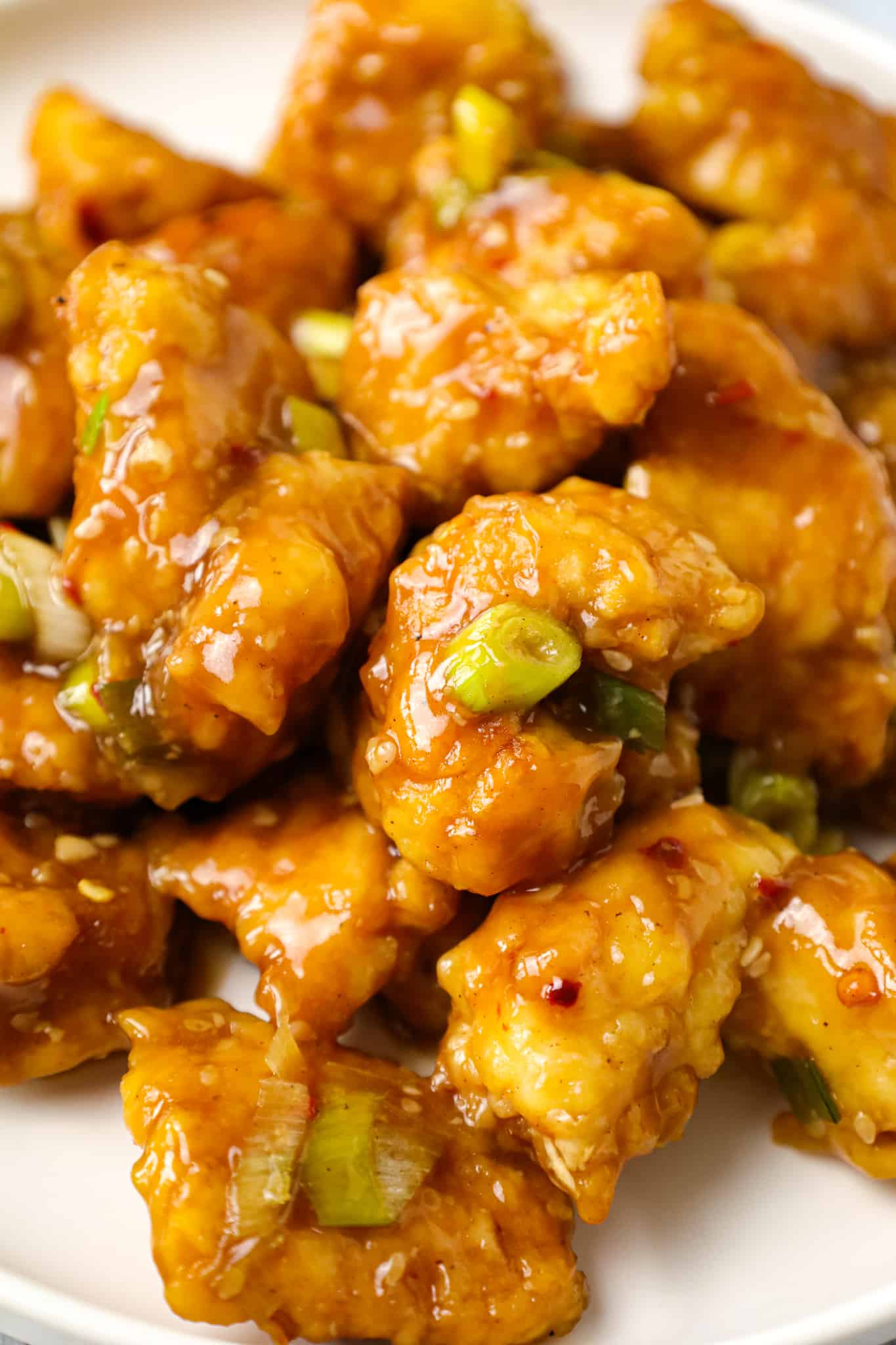 Empress Chicken is a delicious breaded Chinese chicken recipe with a spicy sweet and sour sauce.