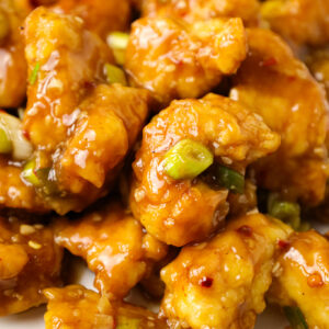 Empress Chicken is a delicious breaded Chinese chicken recipe with a spicy sweet and sour sauce.