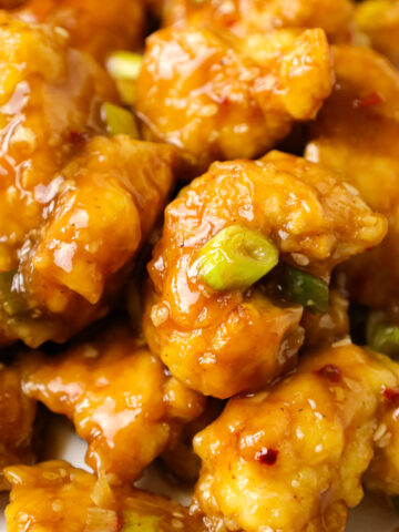 Empress Chicken is a delicious breaded Chinese chicken recipe with a spicy sweet and sour sauce.