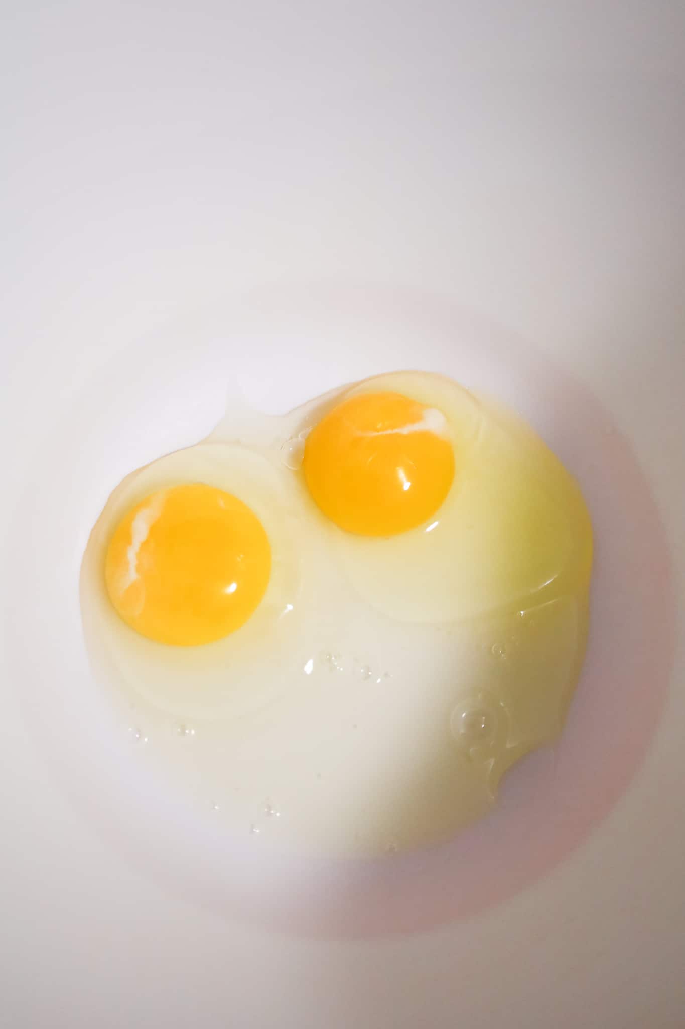 two eggs in a mixing bowl