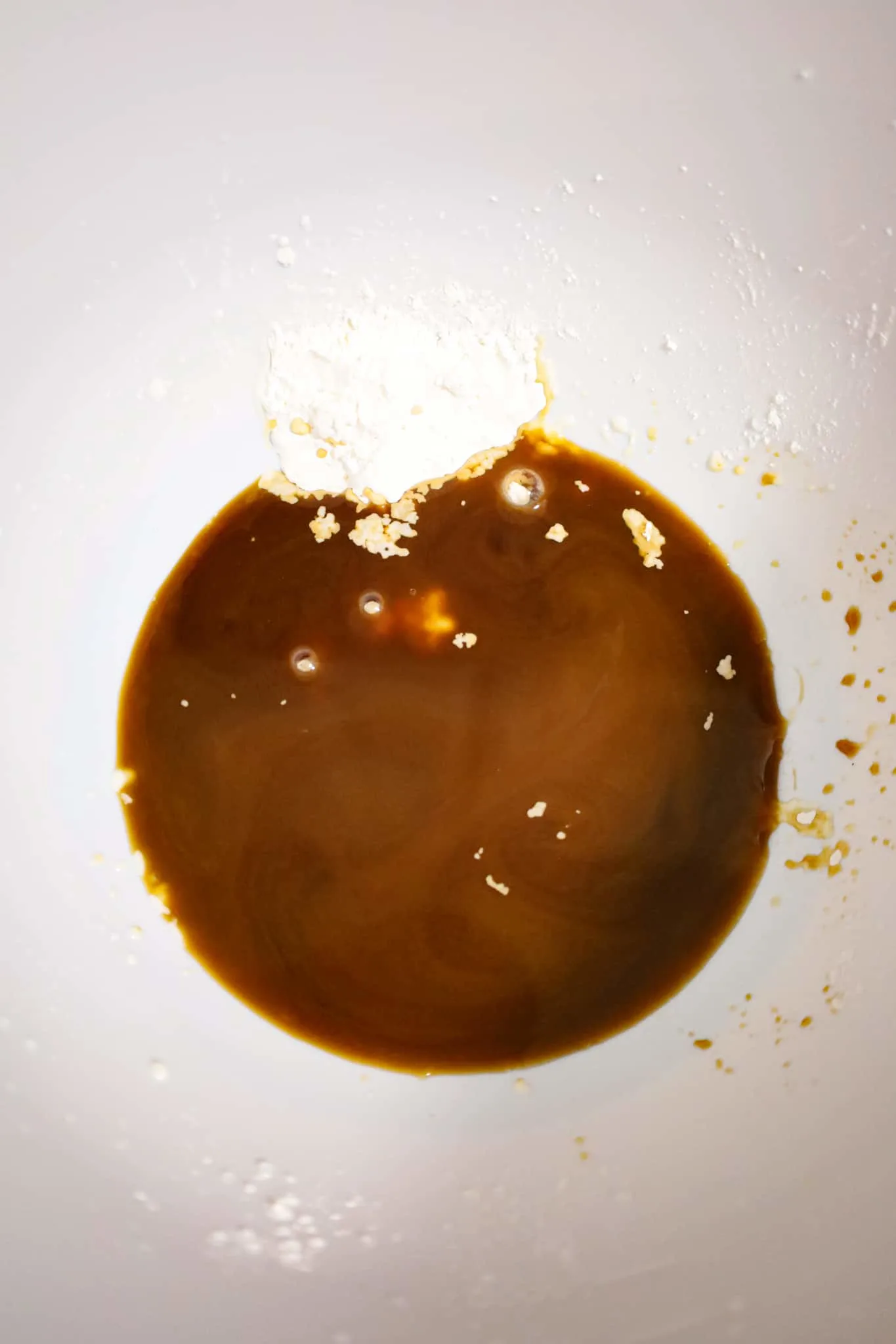 corn starch and soy sauce in a mixing bowl