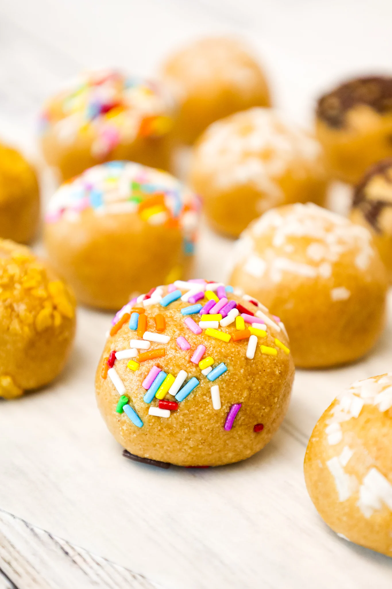 Old Fashioned Peanut Butter Balls are a tasty bite sized snack or dessert recipe that both children and adults will love.