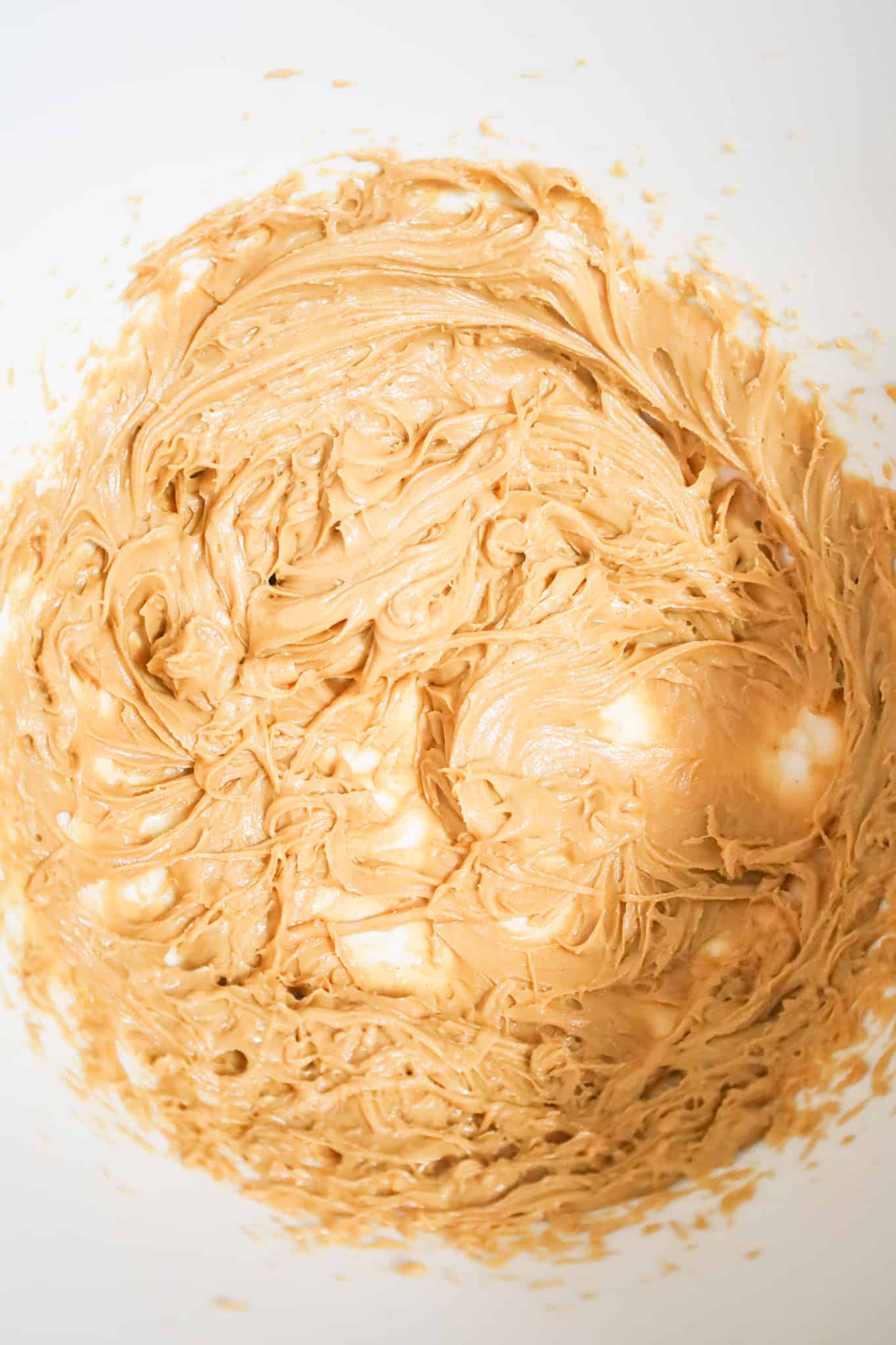 peanut butter and honey mixture in a mixing bowl