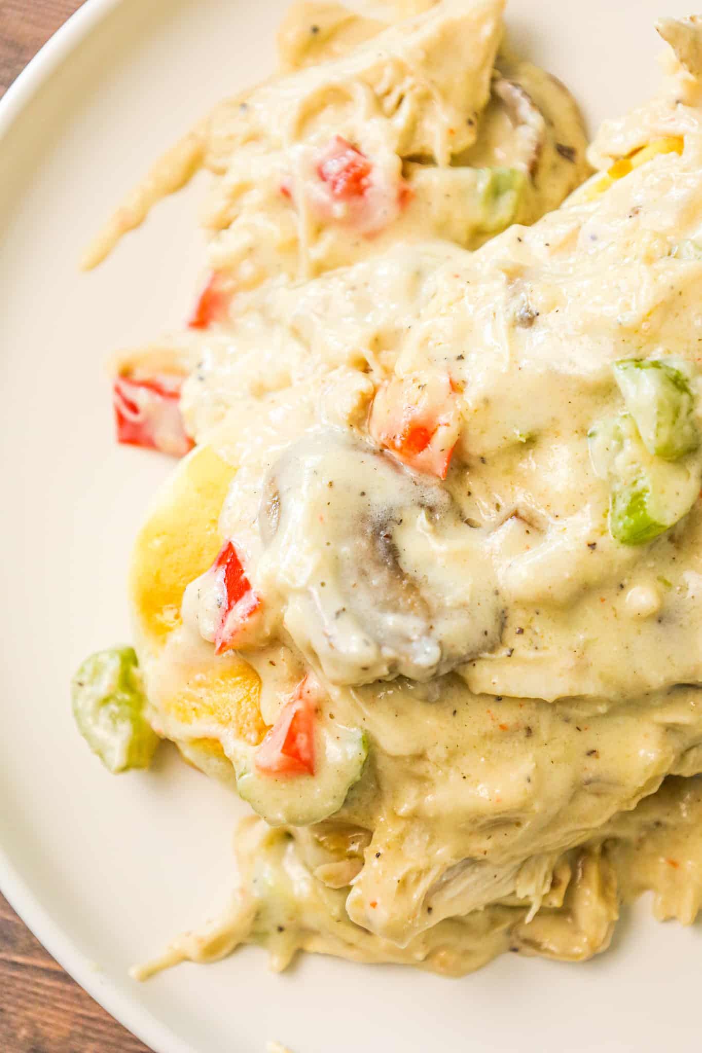 Turkey a la King is a hearty dinner recipe using leftover turkey in a creamy sauce with diced celery, mushrooms, green peppers and red peppers.