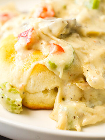 Turkey a la King is a hearty dinner recipe using leftover turkey in a creamy sauce with diced celery, mushrooms, green peppers and red peppers.