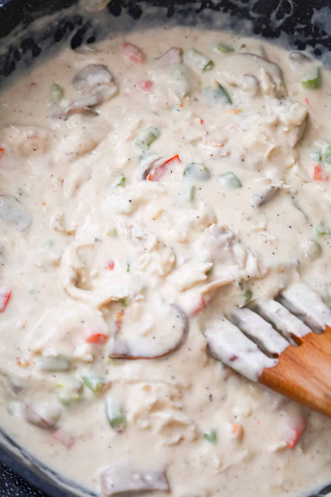 creamy turkey and vegetable mixture in a skillet