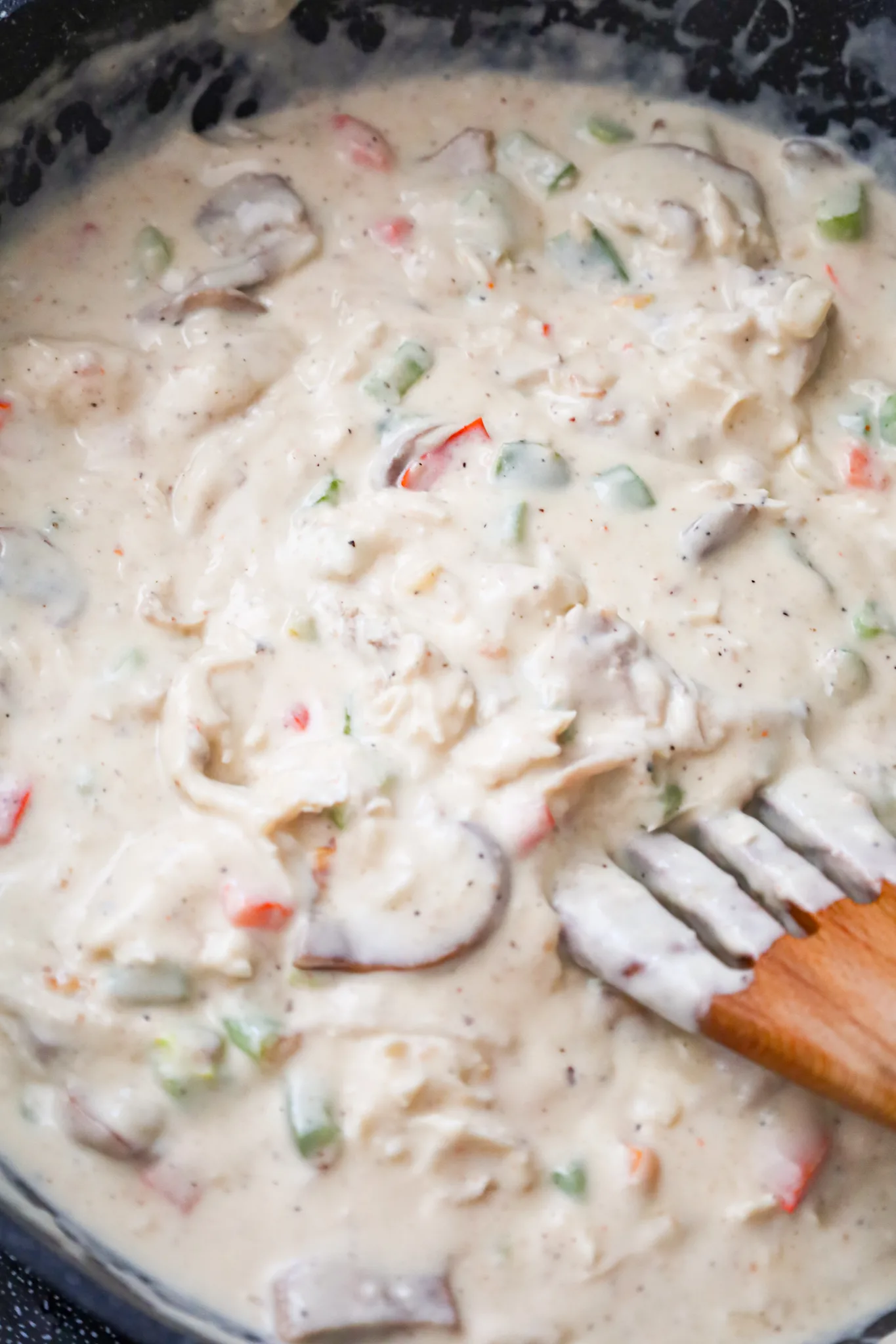 creamy turkey and vegetable mixture in a skillet