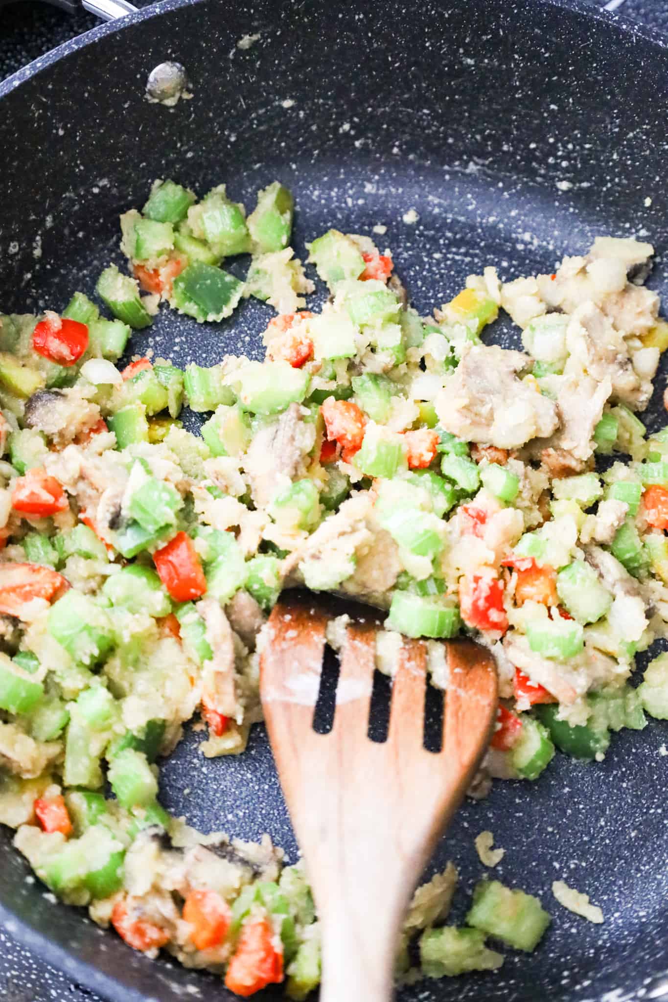 flour coated diced vegetables in a skillet