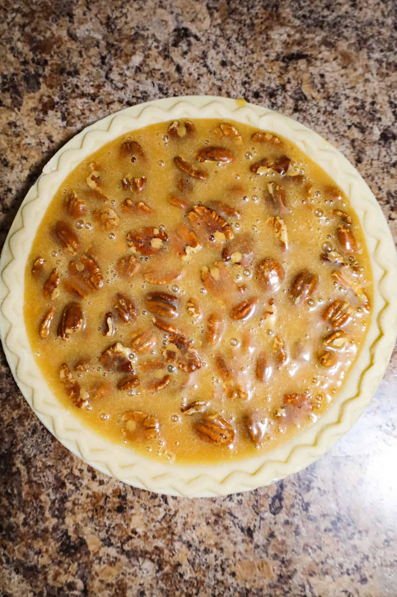 caramel pecan pie before baking