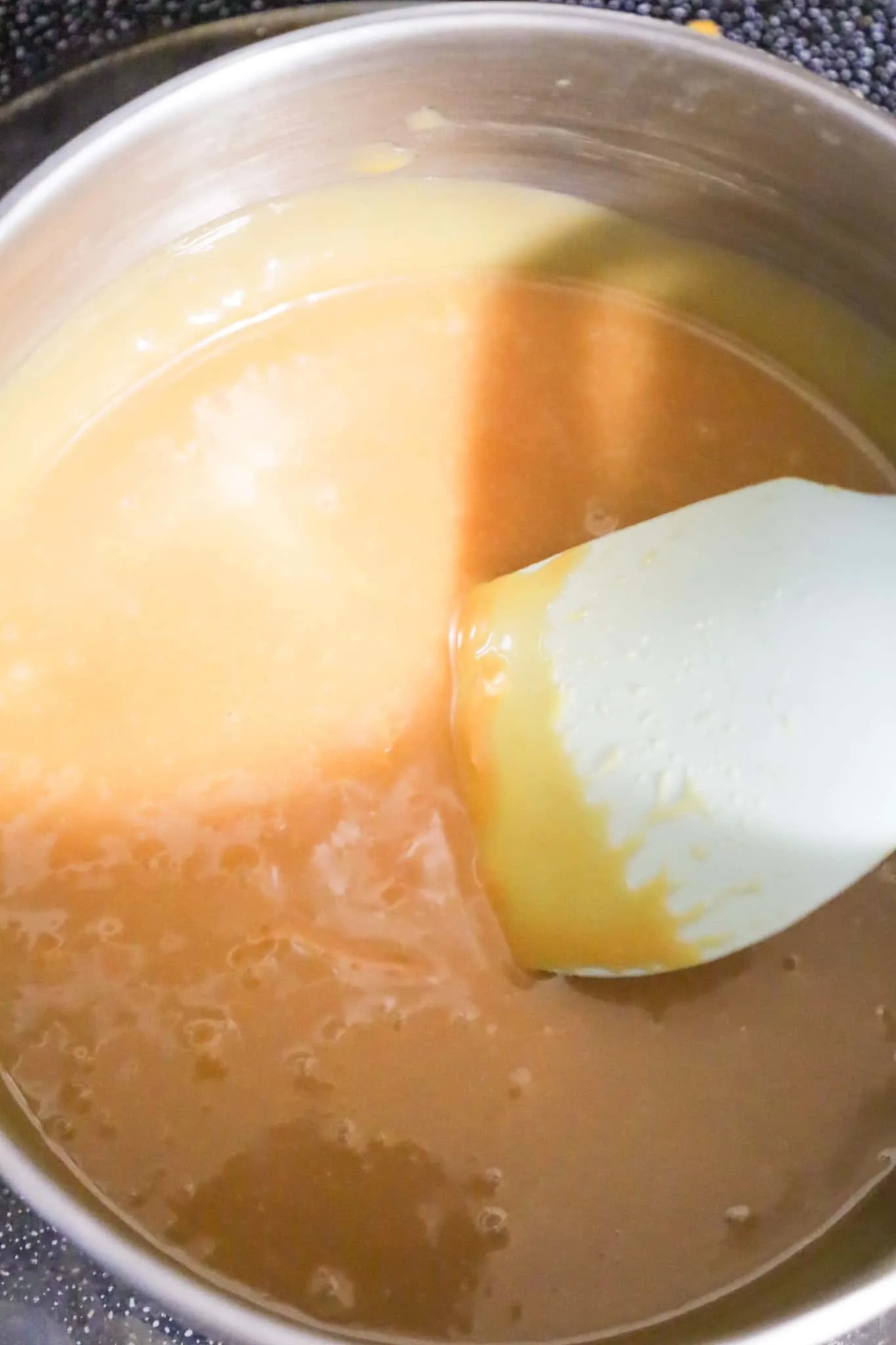 melted caramel in a sauce pot