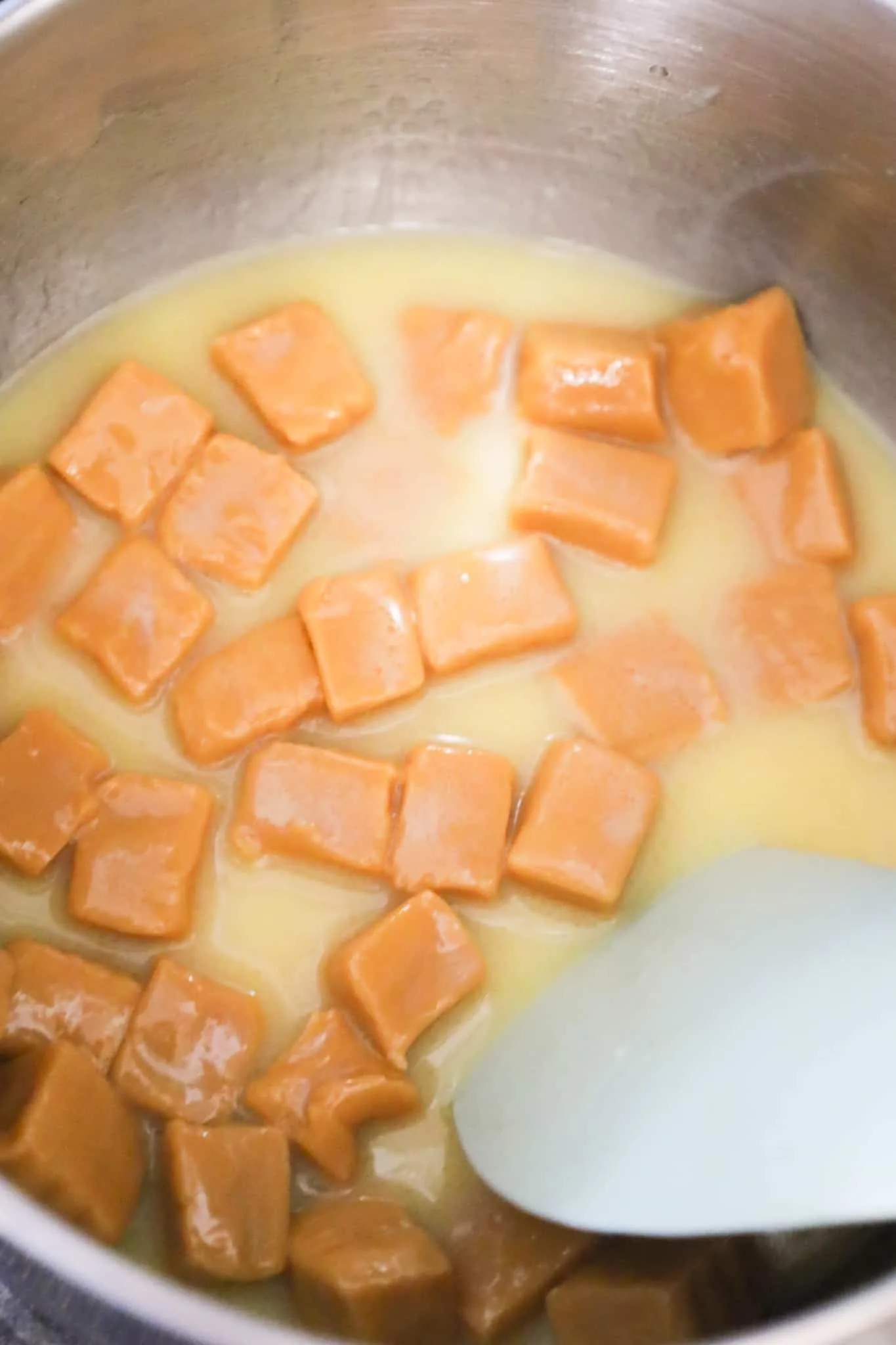 melted butter, milk and Kraft caramels in a sauce pot