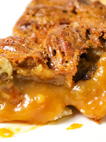Caramel Pecan Pie is a decadent dessert recipe made with a store bought pie crust, Kraft caramels and pecan halves.