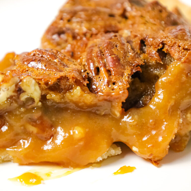 Caramel Pecan Pie is a decadent dessert recipe made with a store bought pie crust, Kraft caramels and pecan halves.