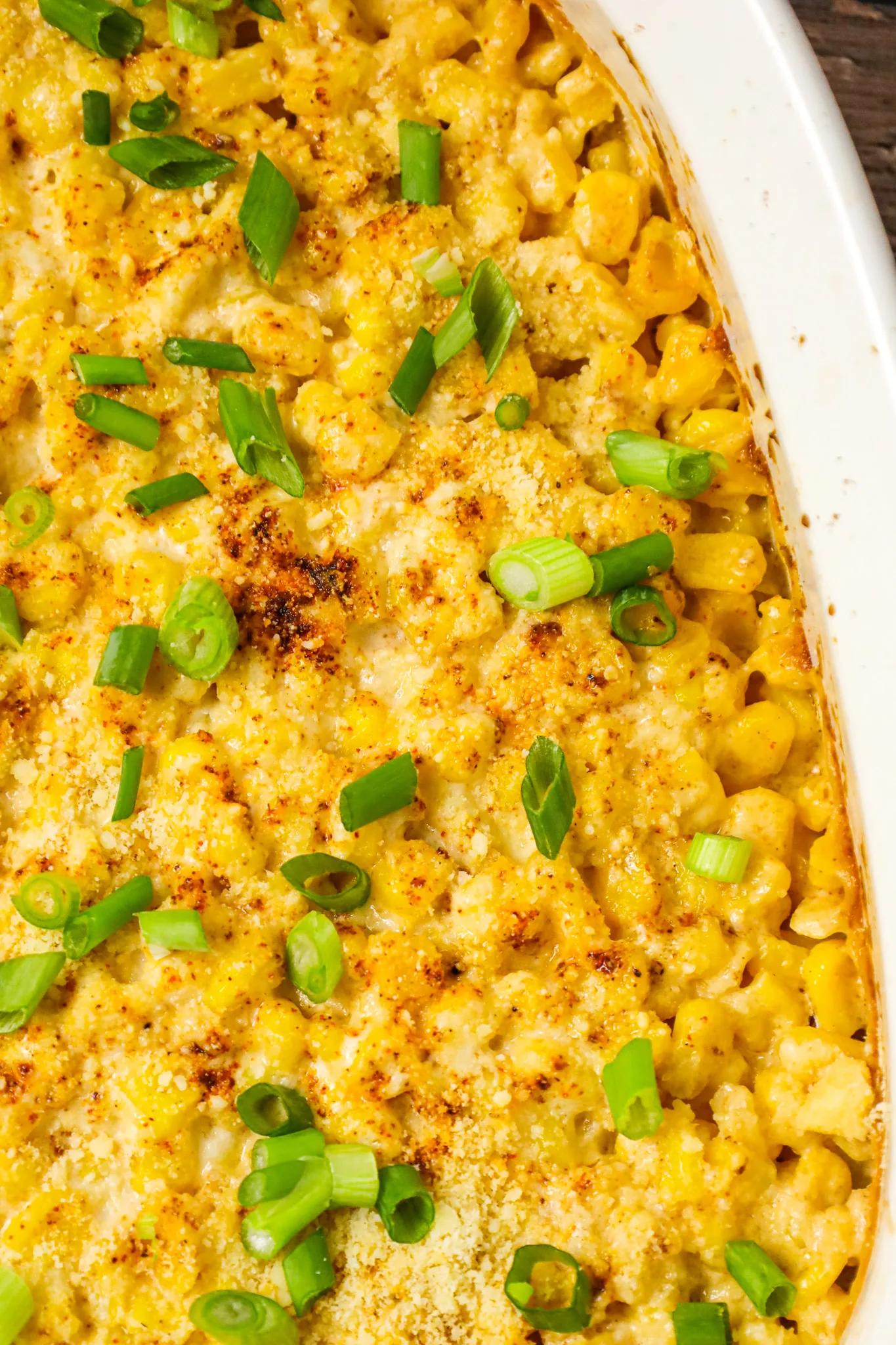 Mexican Corn Casserole is a creamy corn casserole made with frozen corn kernels tossed in sour cream, mayo, chili powder, garlic powder and parmesan cheese.