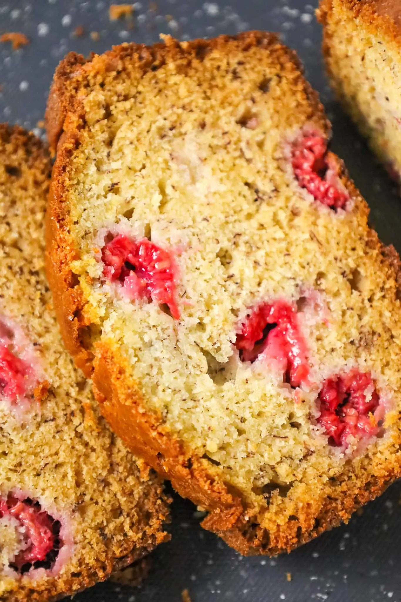 Raspberry Banana Bread is a tasty treat made with ripe bananas and loaded with fresh raspberries.