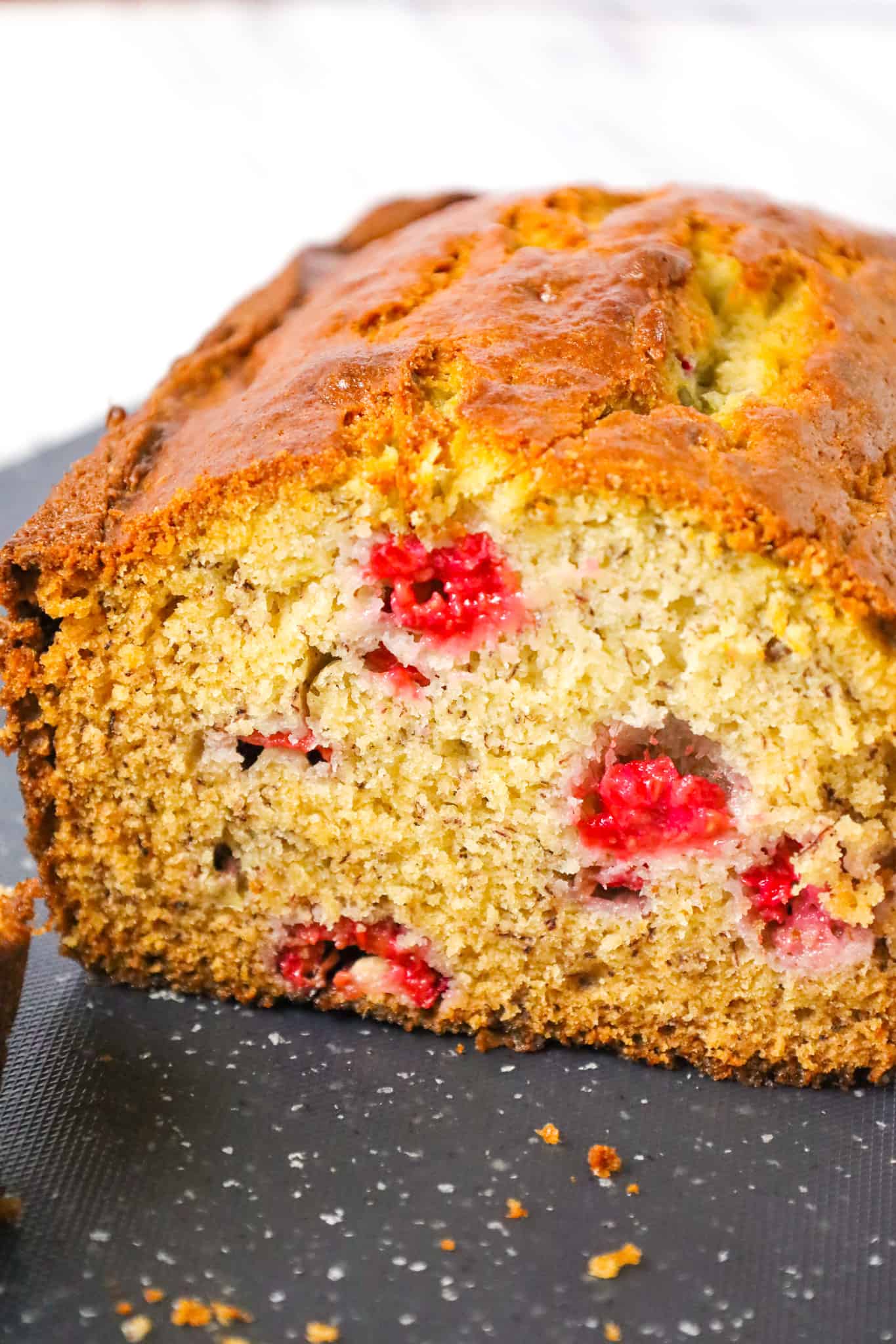 Raspberry Banana Bread is a tasty treat made with ripe bananas and loaded with fresh raspberries.