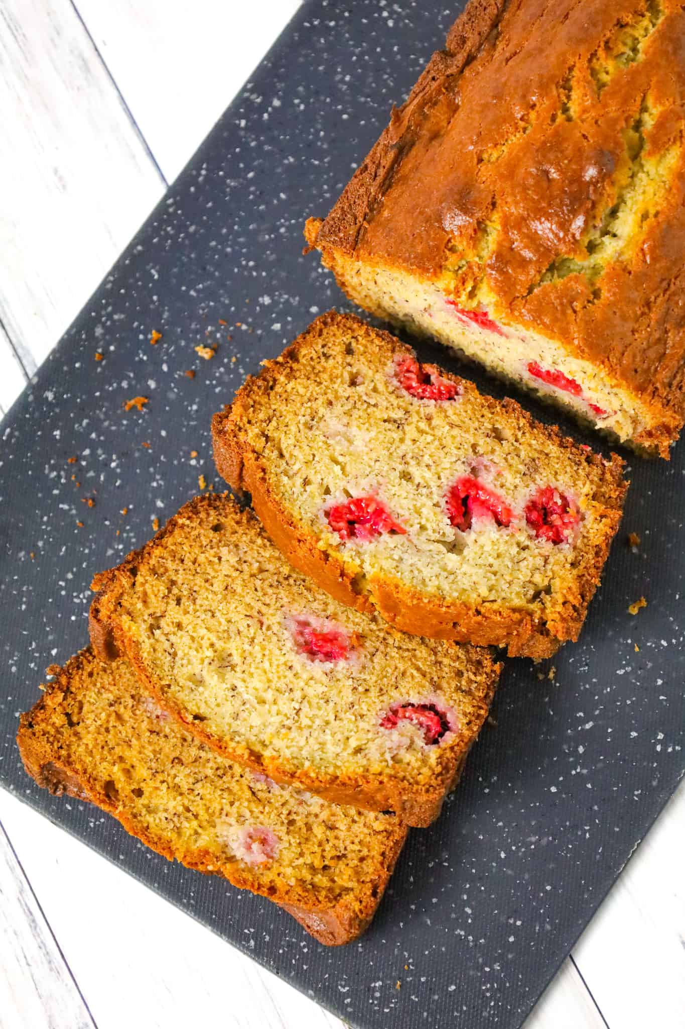 Raspberry Banana Bread is a tasty treat made with ripe bananas and loaded with fresh raspberries.