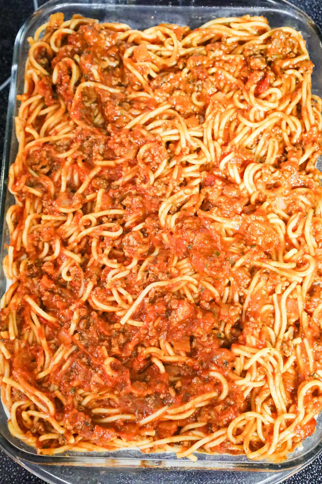 ground spaghetti mixture in a baking dish