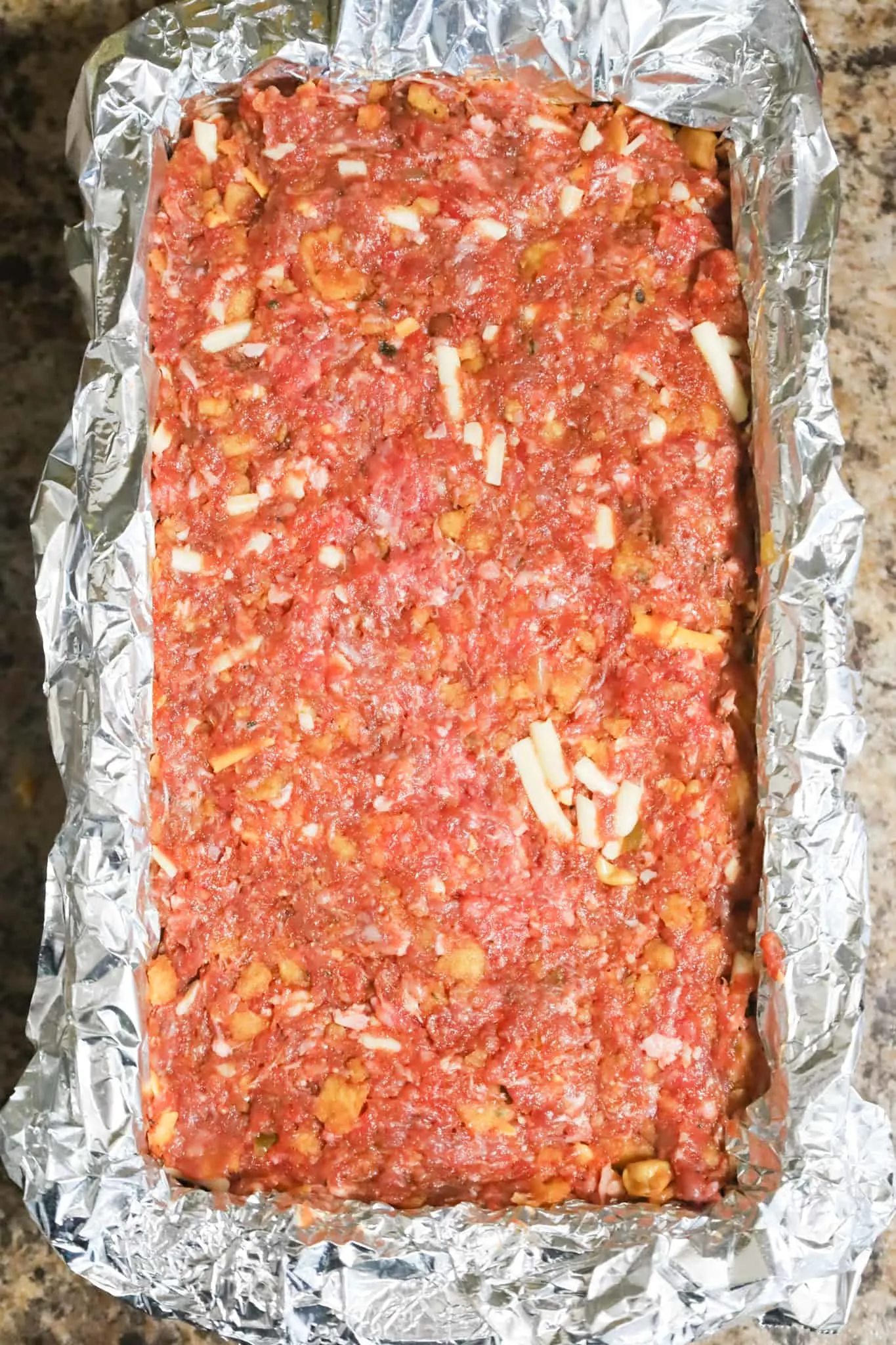 meatloaf mixture in a loaf pan before cooking