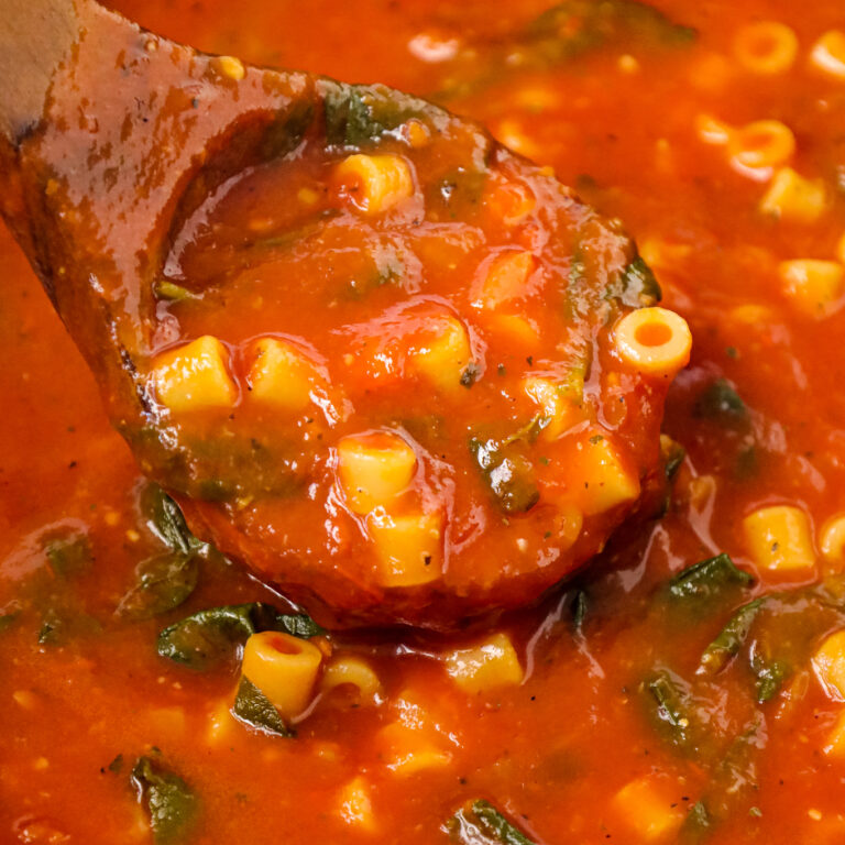 Tomato Florentine Soup is a hearty soup recipe made with crushed tomatoes and loaded with baby spinach and pasta.