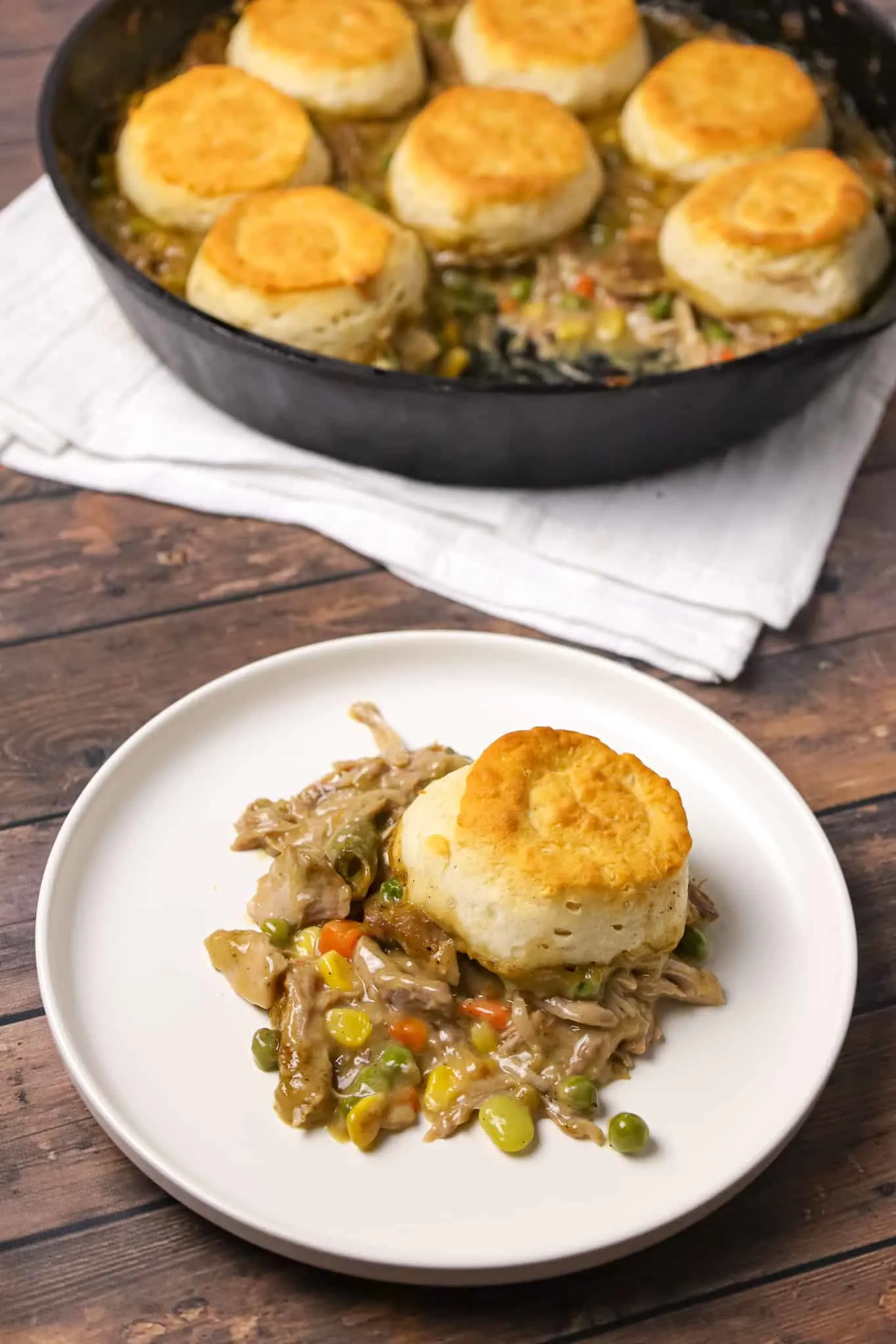 Turkey Pot Pie with Biscuits is an easy recipe loaded with frozen veggies, leftover Thanksgiving turkey, cream of chicken soup and refrigerated biscuits.