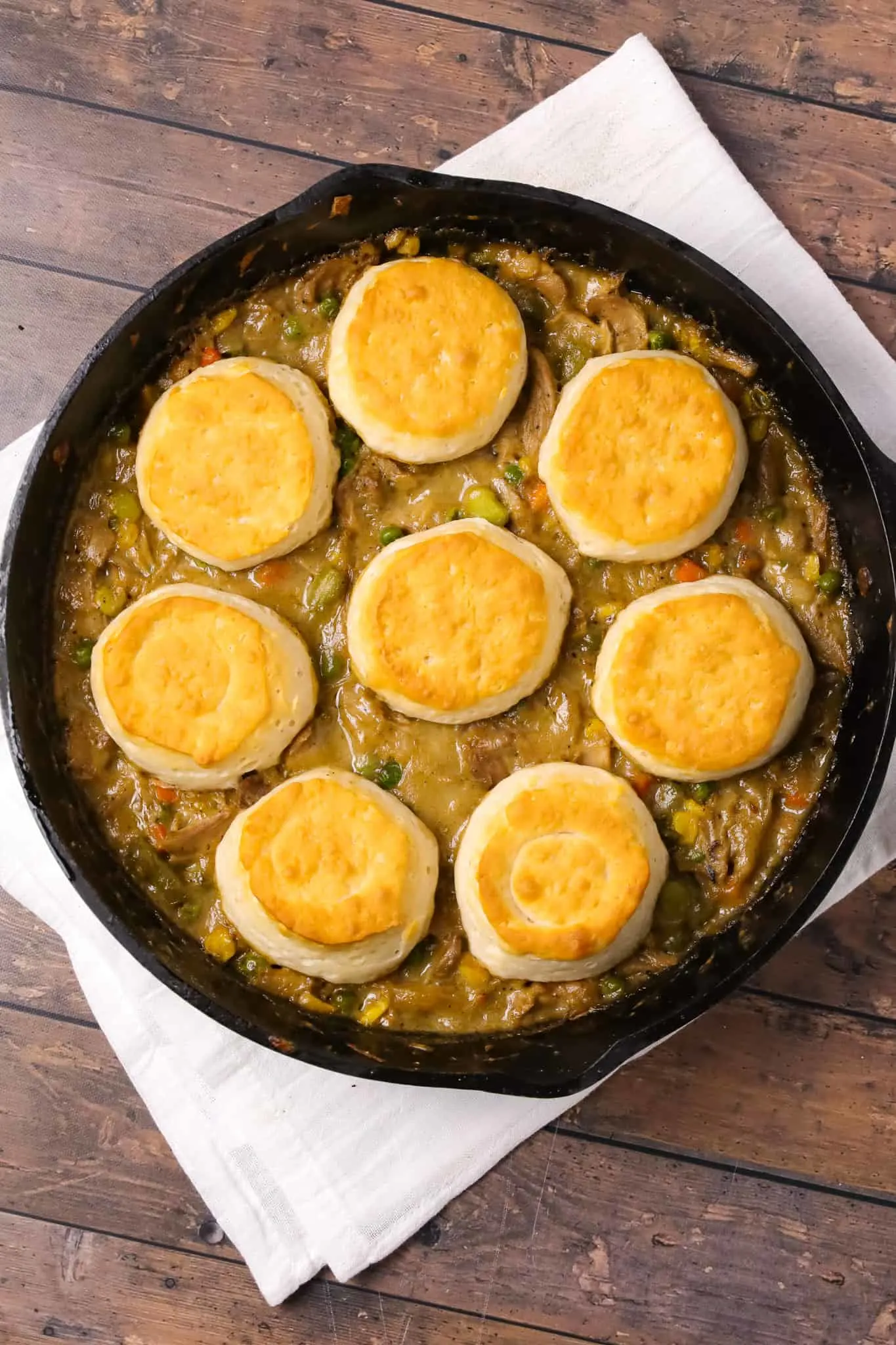 Turkey Pot Pie with Biscuits is an easy recipe loaded with frozen veggies, leftover Thanksgiving turkey, cream of chicken soup and refrigerated biscuits.