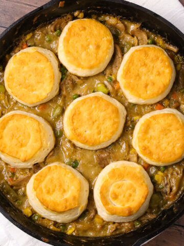 Turkey Pot Pie with Biscuits is an easy recipe loaded with frozen veggies, leftover Thanksgiving turkey, cream of chicken soup and refrigerated biscuits.