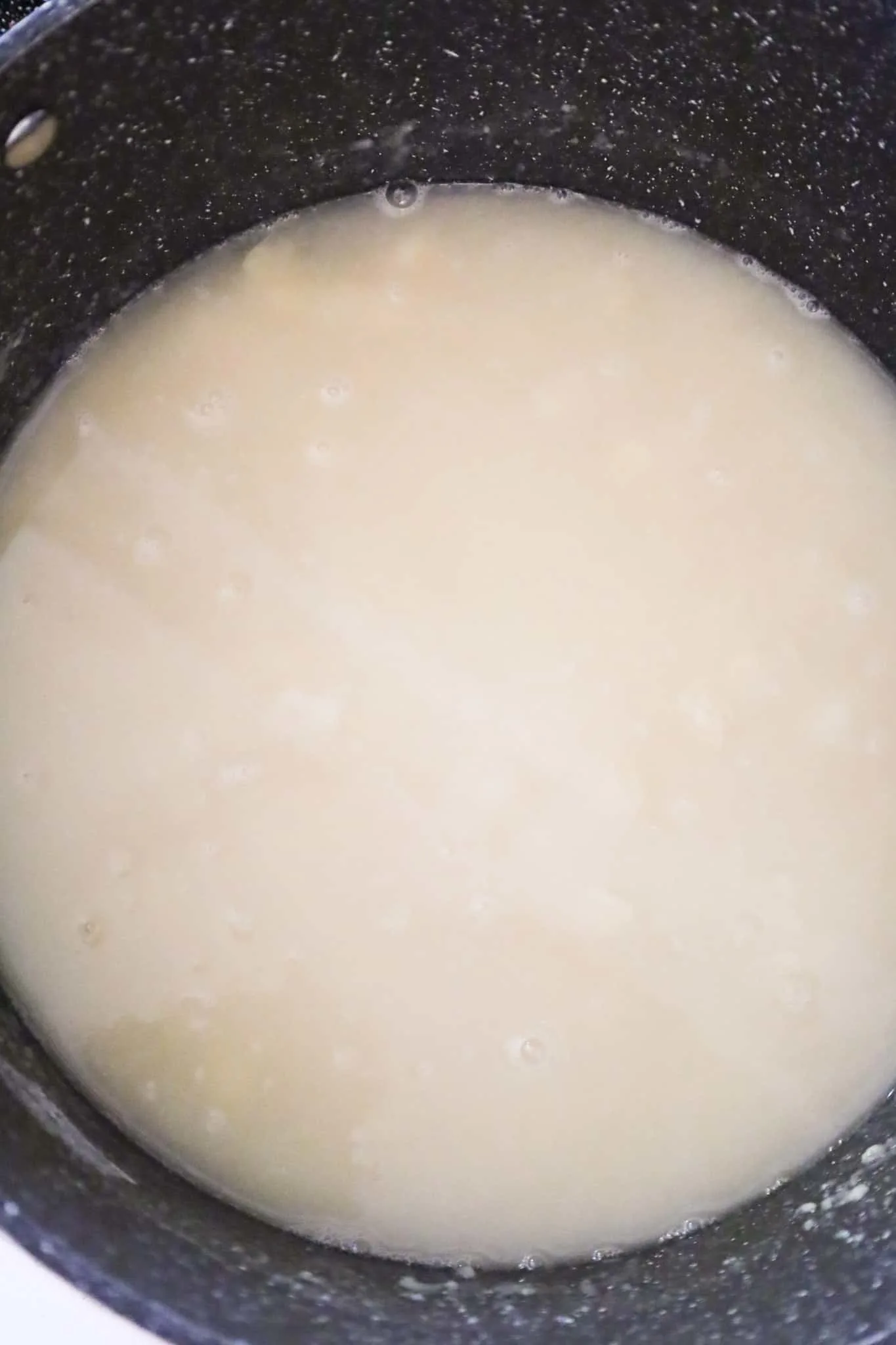 chicken broth added to flour, butter and diced onions in a large pot