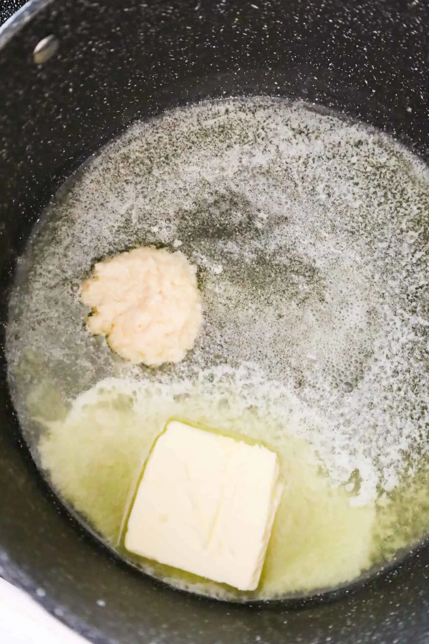 butter and garlic puree in a large pot