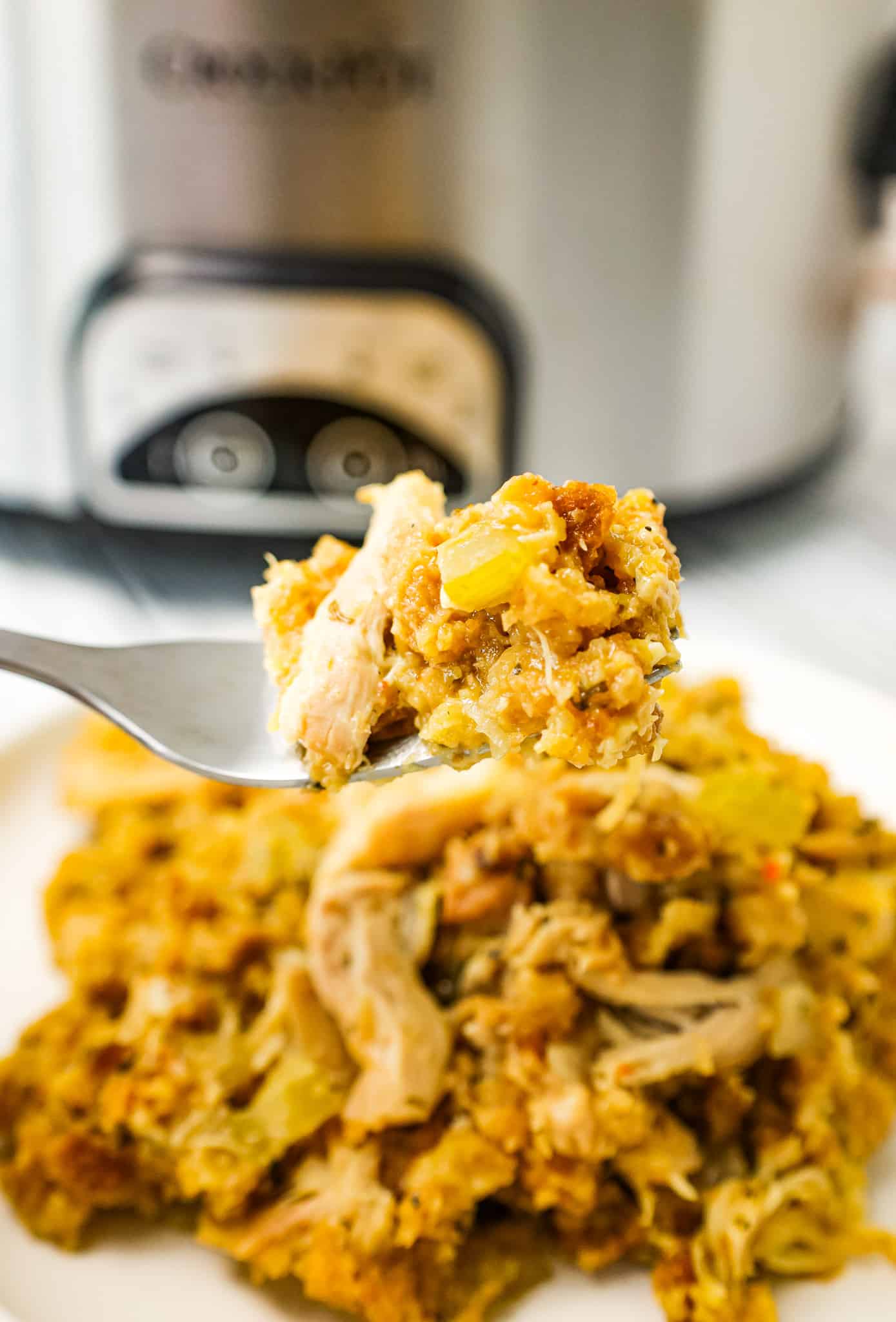 Crock Pot Chicken and Stuffing is a hearty slow cooker dinner recipe made with boneless, skinless chicken thighs and Stove Top stuffing mix.