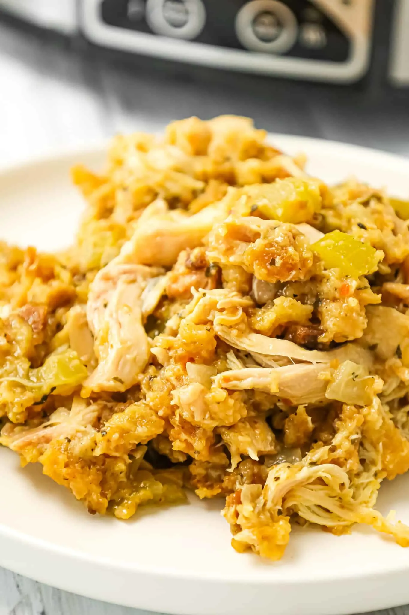 Crock Pot Chicken and Stuffing is a hearty slow cooker dinner recipe made with boneless, skinless chicken thighs and Stove Top stuffing mix.