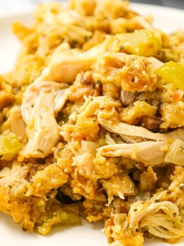 Crock Pot Chicken and Stuffing is a hearty slow cooker dinner recipe made with boneless, skinless chicken thighs and Stove Top stuffing mix.