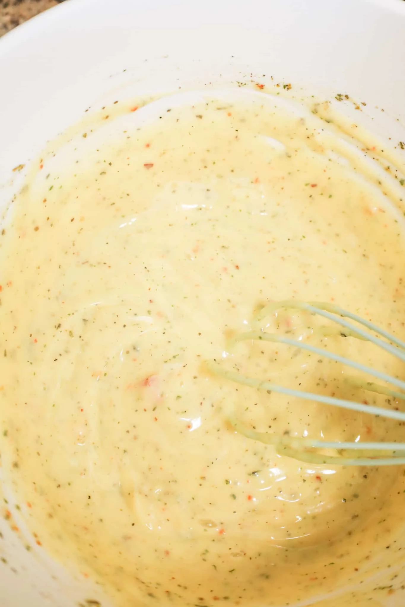 cream of chicken soup and seasoning mixture in a mixing bowl