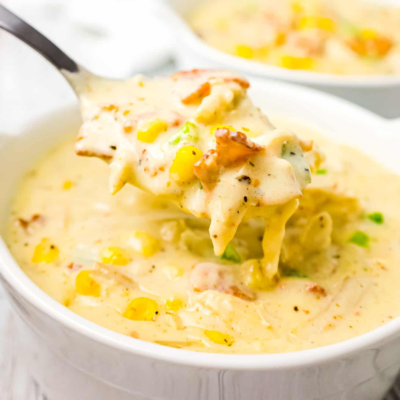 Turkey Corn Chowder with Bacon is a creamy soup recipe loaded with shredded turkey, corn, bacon and chopped green onions.