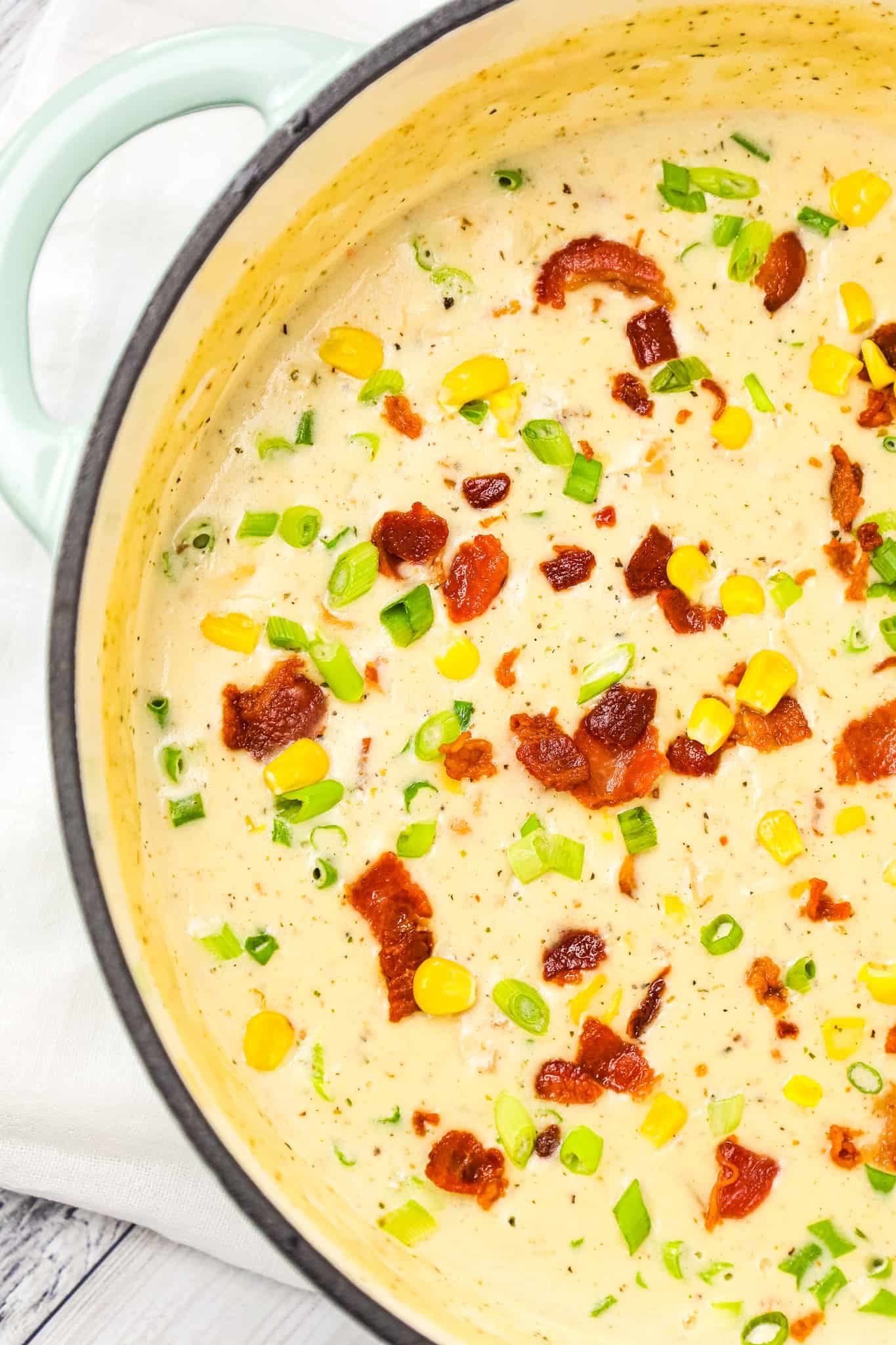 Turkey Corn Chowder with Bacon is a creamy soup recipe loaded with shredded turkey, corn, bacon and chopped green onions.