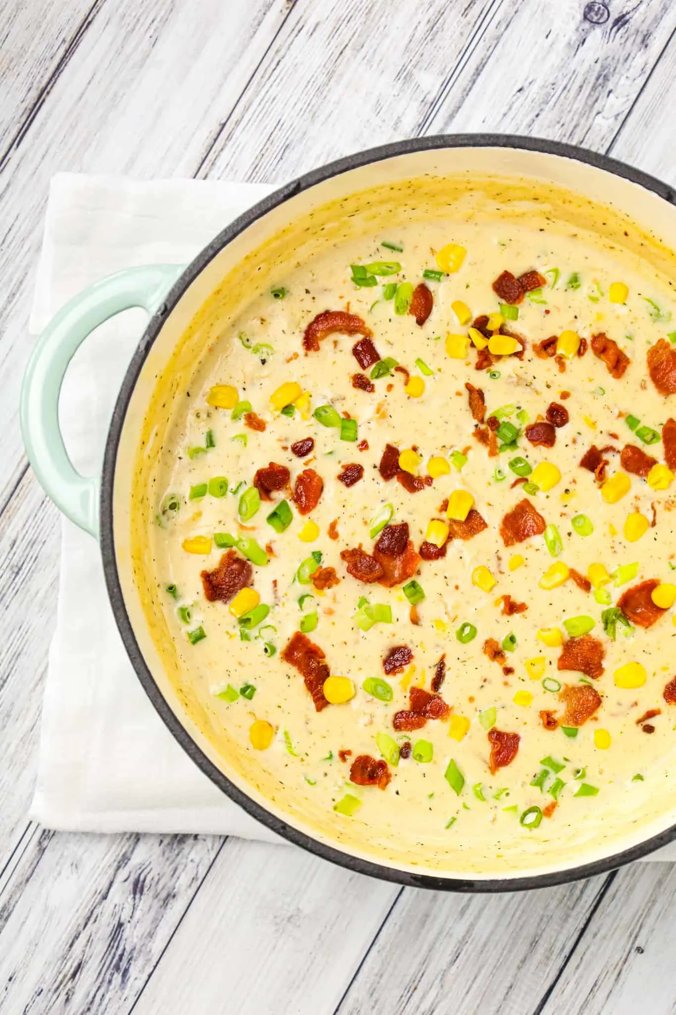 Turkey Corn Chowder with Bacon is a creamy soup recipe loaded with shredded turkey, corn, bacon and chopped green onions.