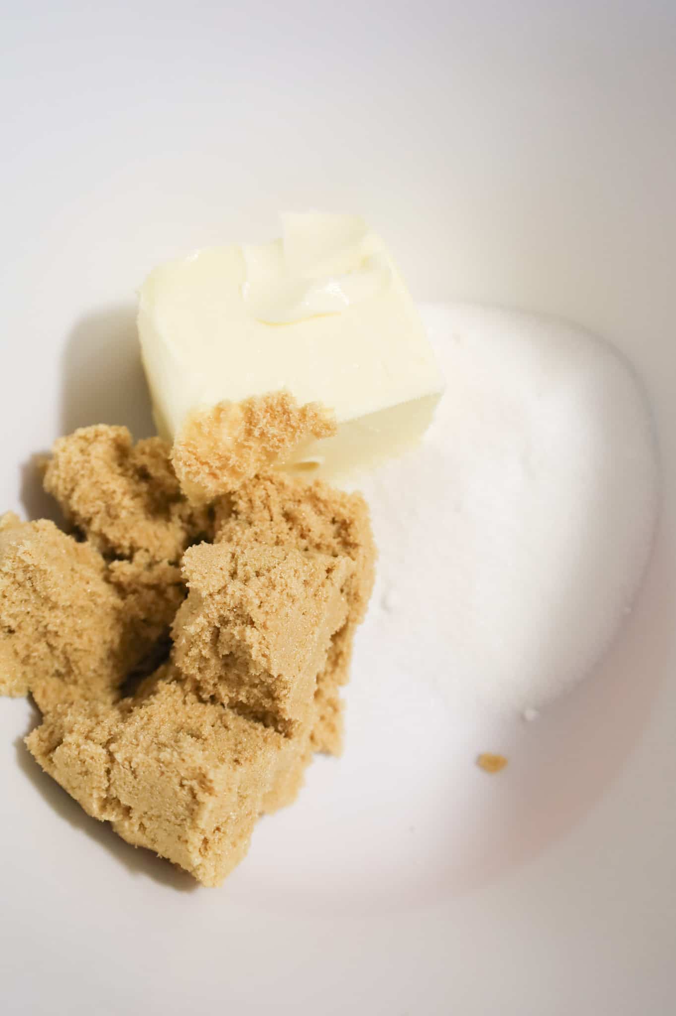softened butter, brown sugar and granulated sugar in a mixing bowl.