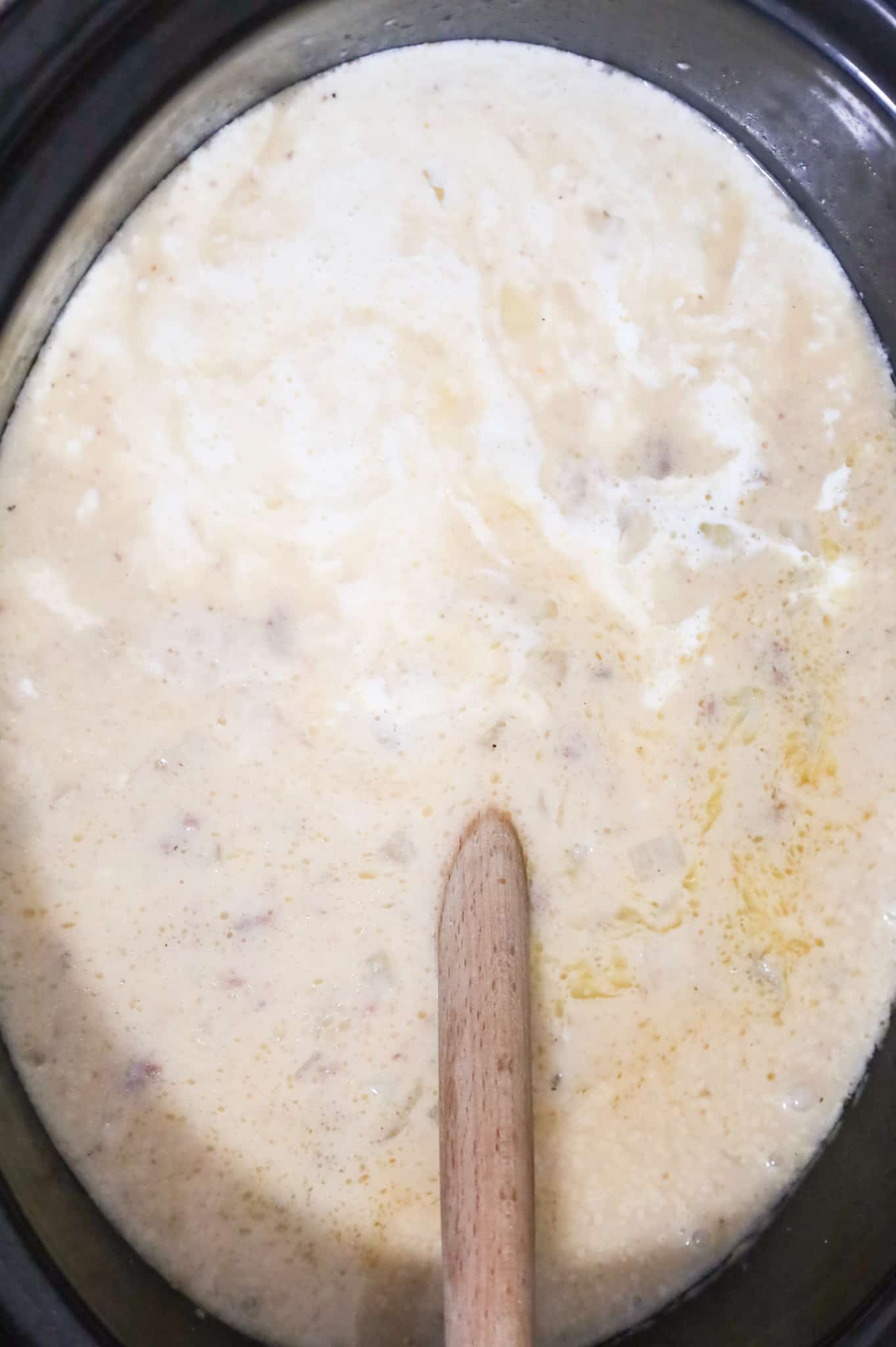 heavy cream added to cheeseburger soup in a crock pot