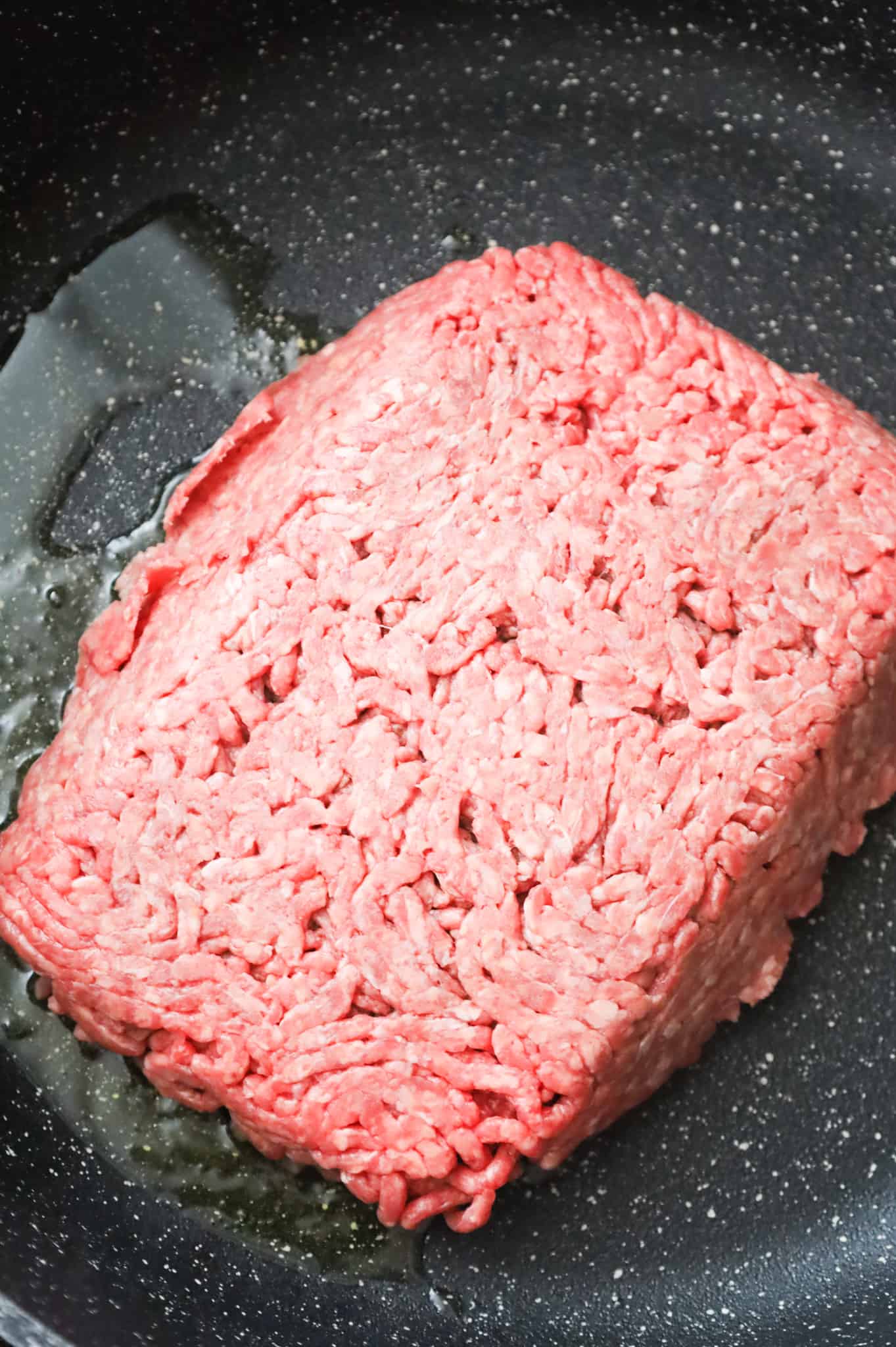 lean ground beef in a large skillet with olive oil
