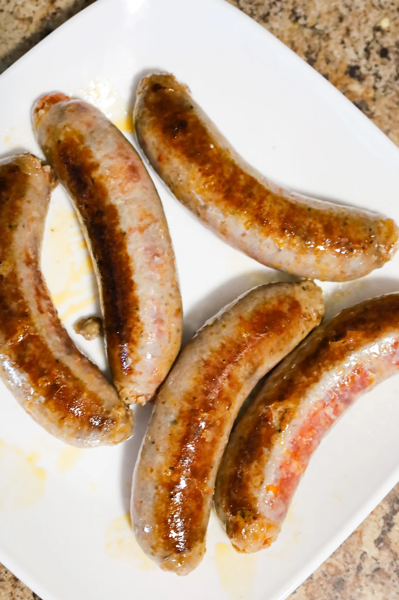 browned sausages on a plate